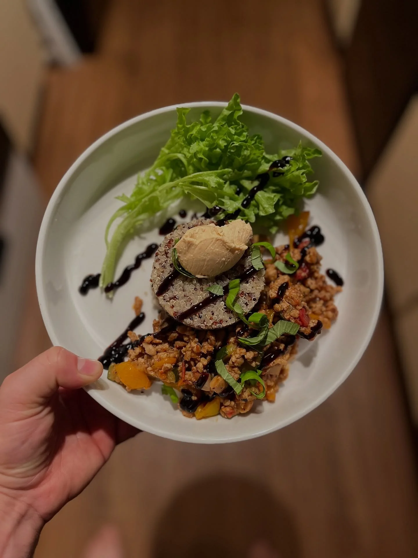 Ground chicken simmered in coconut cream with fire-roasted tomatoes, zucchini, and peppers &mdash; finished with chipotle honey goat cheese, basil, quinoa, and a balsamic glaze. #lowfodmap