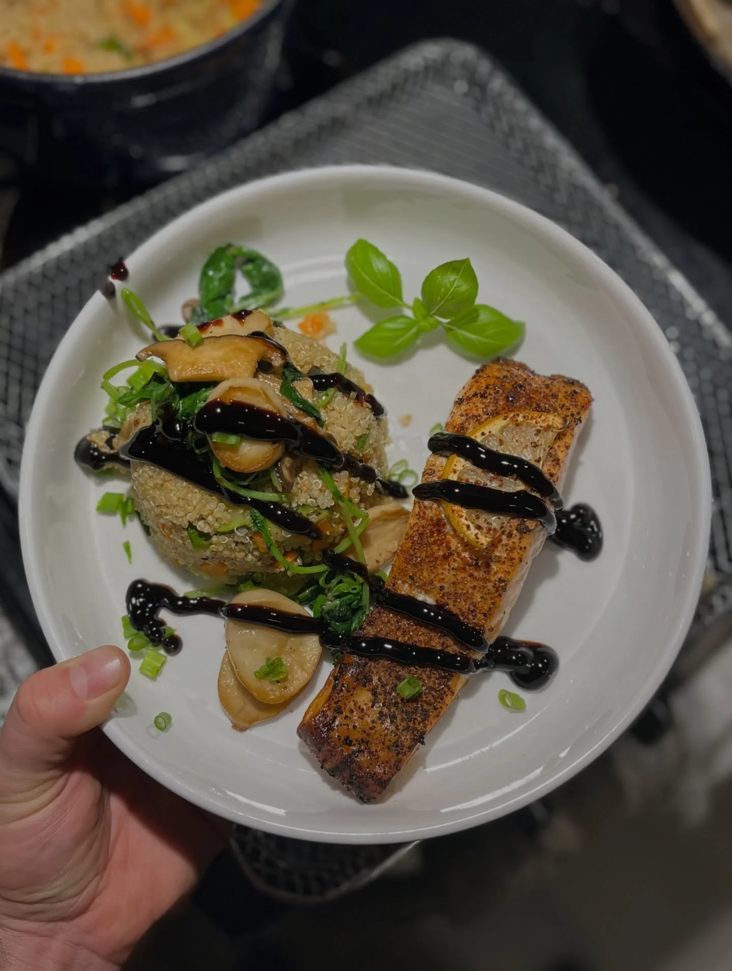 Tequila-lime salmon. Herbed quinoa with saut&eacute;ed zucchini, &amp; carrot. Saut&eacute;ed king oyster mushrooms &amp; baby kale. Fresh chives, lime.