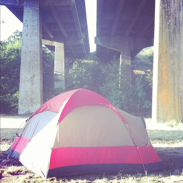 Camped under I-5 today, next to some train tracks. (Taken with Instagram )
