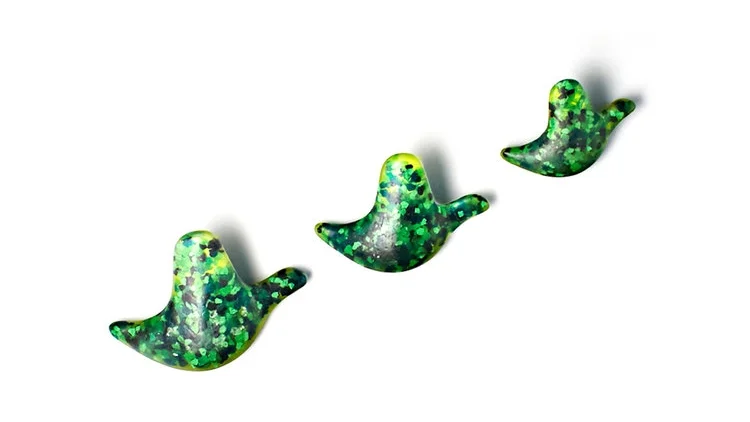 Flocked Flocked wall hooks reinterpret the retro flying duck for contemporary living. Using recycled glass, these beautifully handcrafted hooks make a gorgeous wall piece. The hand casting process ensures that each is truely unique. They offer a space saving-solution for hanging coats and bags in both a domestic and commercial context. They are excellent for hanging towels in the bathroom and can be easily unclipped and removed from the wall for cleaning. They are sold as a set which contains a family of three - small, medium and large. Colours Forest Green Blood Orange Blue Moon Lime Price $330 for set of three