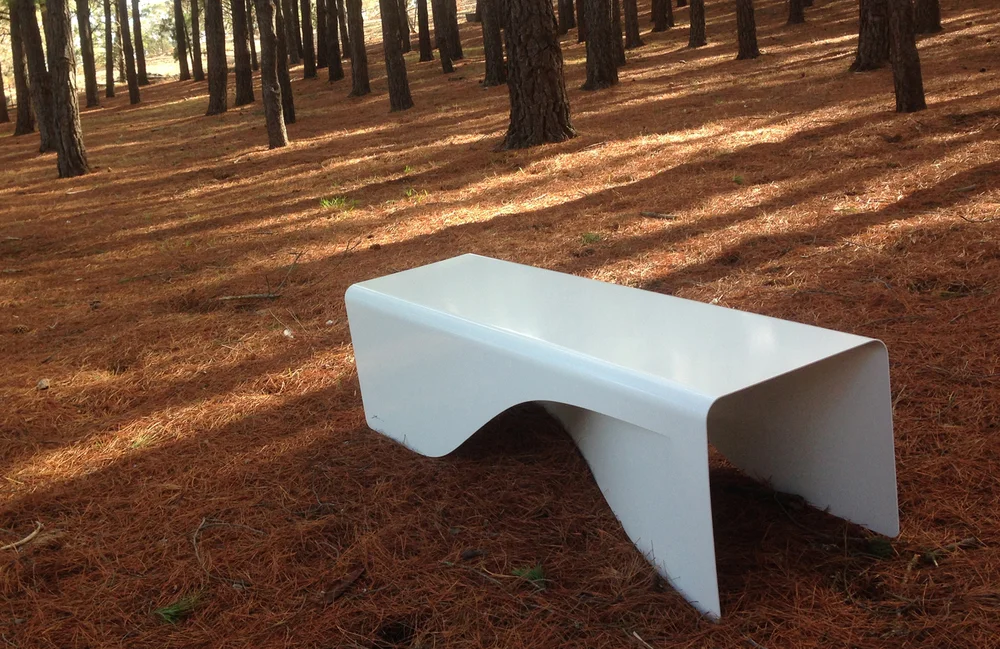 Wave Beach - $2,300.00 Simple clean one piece design. Contemporary statement. Expressive sculpture lines. Weatherproof easy to clean. Suits indoor or outdoor Material: Aluminum powder coated. Size: L1490 x W450 x H420mm Weight: Approx. 19kg