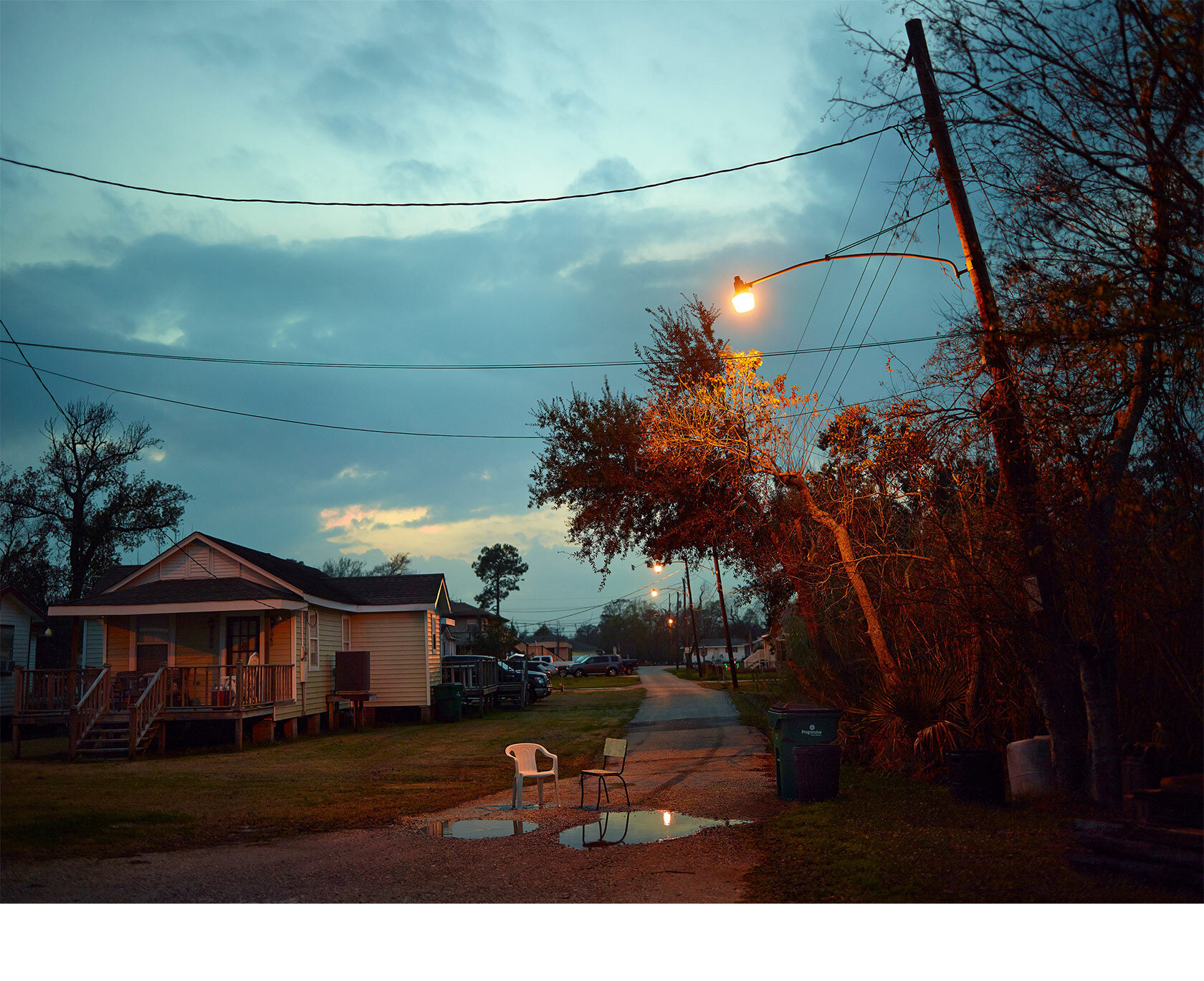 Driveway-Chairs-The-Other-Side-Of-Christmas-Barry-Salzman.jpg