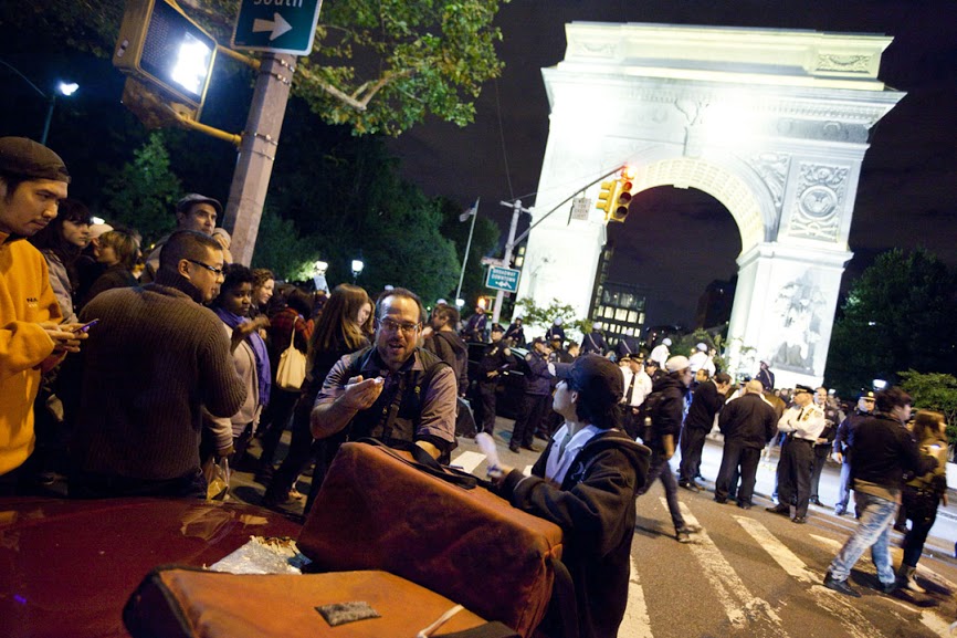 On assignment, Occupy Wall Street. Photo by Michael Nagel.