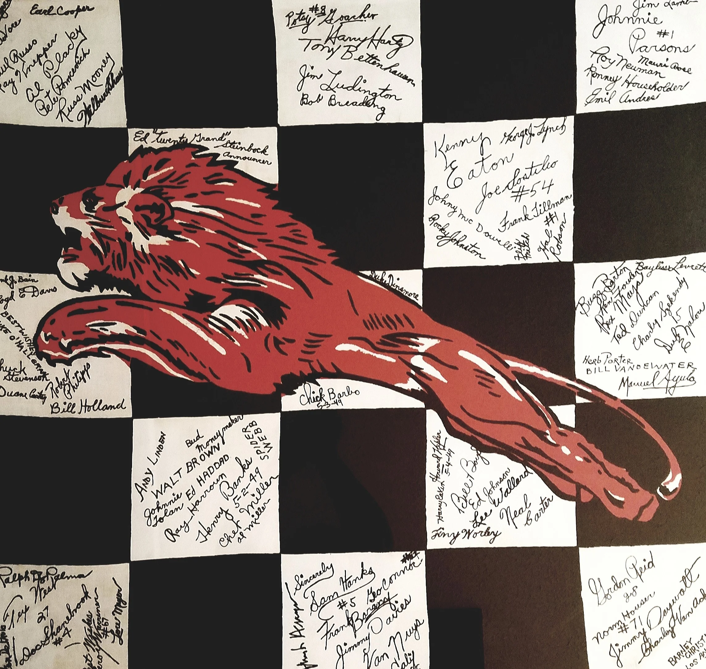 This is a race flag which my grandfather created in the late 1940s and early 1950s. He had many of the famous drivers of the day sign it including Ray Haroon, the winner of the first Indy 500 in 1911, and all the three-time winners up to that time — Mauri Rose, Wilbur Shaw and Louie Meyer.