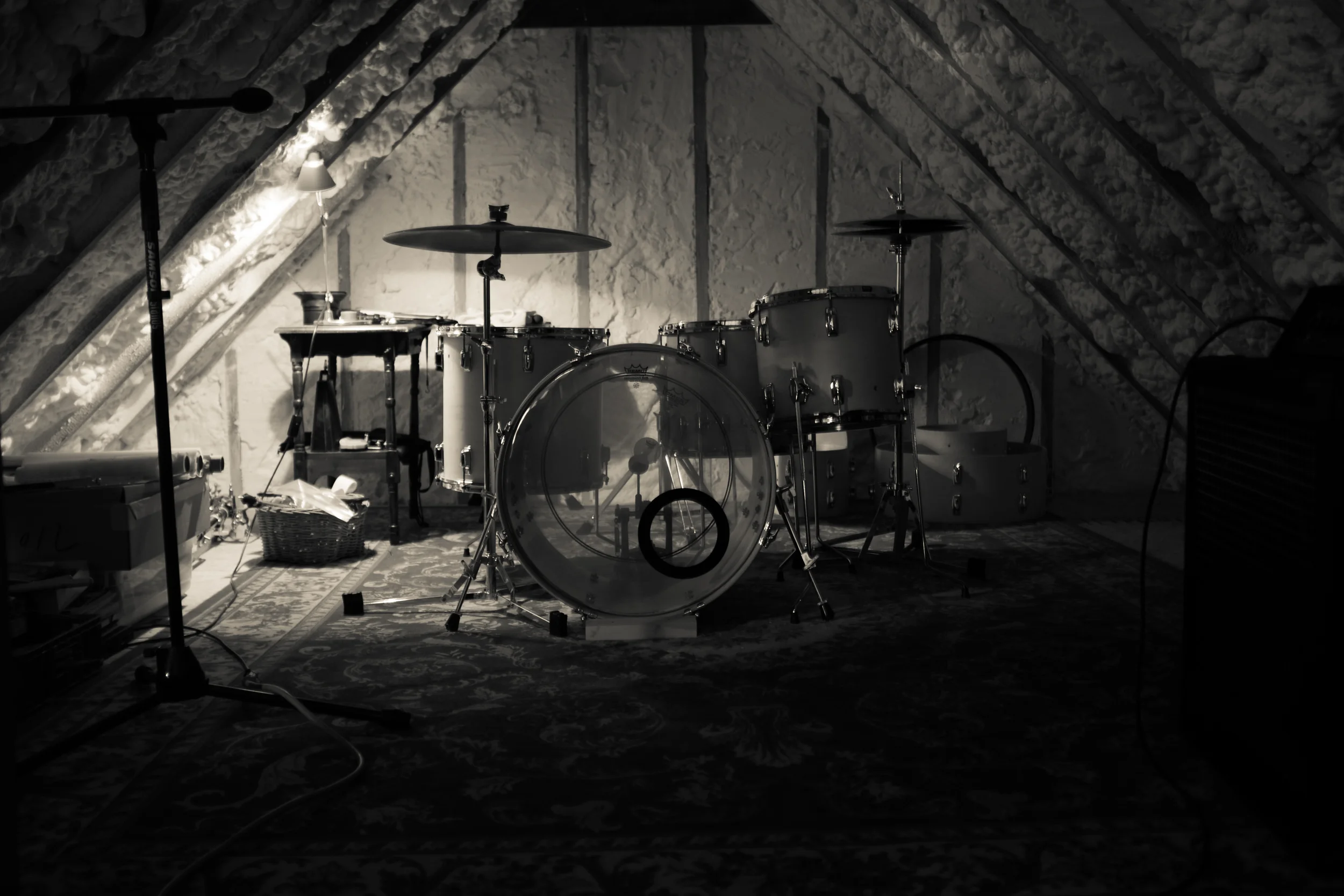 Brontes is a ca. 1986 Ludwig Rocker kit with clear interiors (not the Rocker 2 shit ones). Shells are the same ones Ludwig used on their Super Classics - a 4-ply, birch/poplar/ poplar/birch assembly. This kit was my first (thanks Mom and Dad!) and only. It's a 9-piece kit, but I only use the 4 shown. It originally sported a "Silver Smoke" finish, a wrap, which was poorly adhered and really did more to degrade the sound of the shells than anything. That was the first to go. The original bearing edges were also poorly executed and as you can see below, were cut off and re-routed. I went with a full round-over or baseball edge seen more on their 1950's era mahogany sets and not the original rounded 45....sorry die-hard fans - I wanted a warm, resonant, woody sound out of these guys and didn't mind sacrificing some of the attack. The final finish is nothing more than two coats of wax which will need to be re-applied annually, but it works great to keep dust, smoke and the occasional beer spill from doing any real damage. Check out some of the process below...more pics headed your way soon....