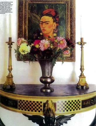 Frida Kahlo’s Self-Portrait with Monkey above a Russian console in Madonna’s Beverly Hills home