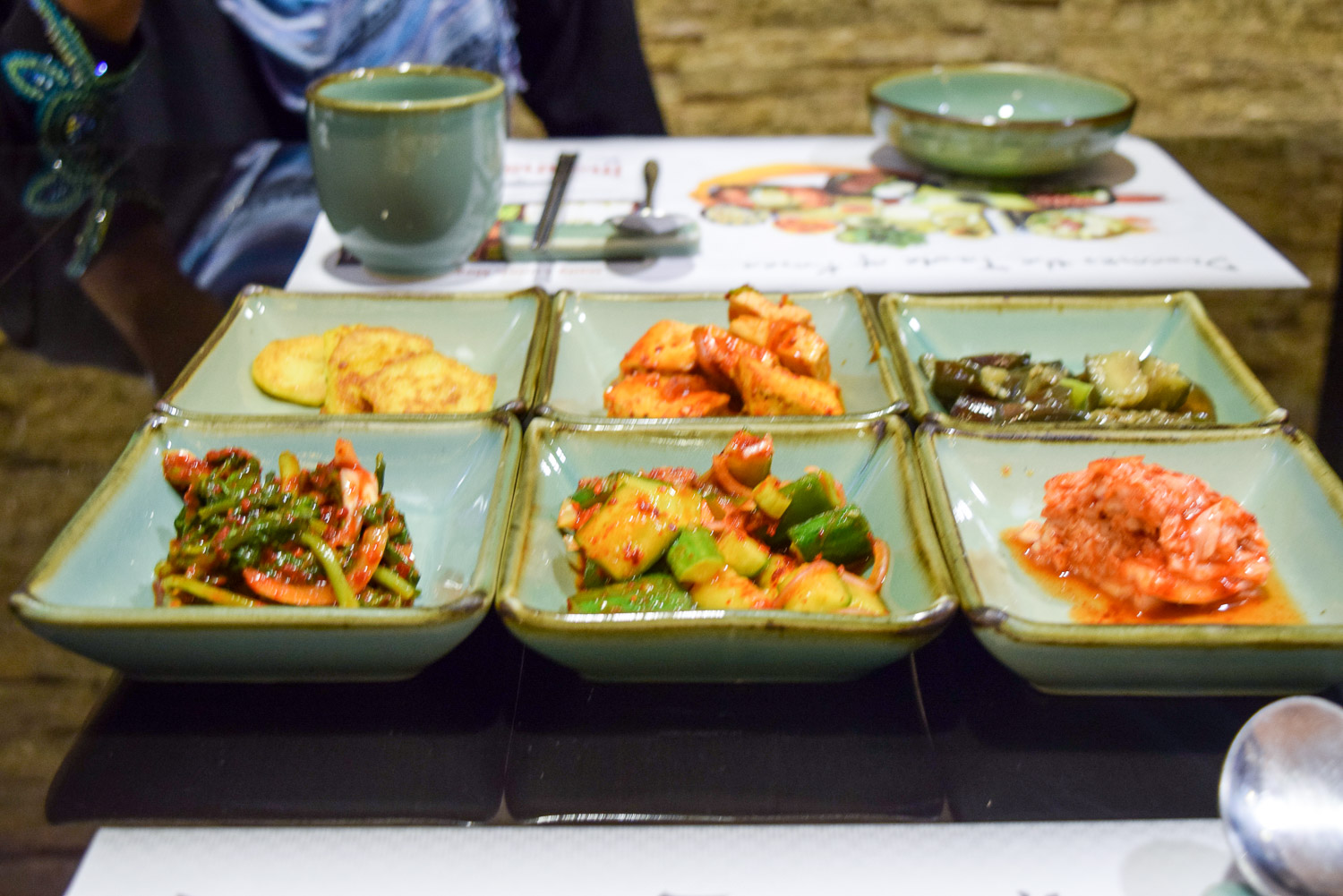 Our side dishes from Top Right - Egg plant (which I didn't try), Tofu, Fried Pumpkin (turns out I don't like pumpkin). Bottom Right - Kimchi (I wanted to, just couldnt bring myself to try after Aishah pulled a face), Diced cucumber and carrots, Spinach (My Fave! Tasted like cold spicy efo)