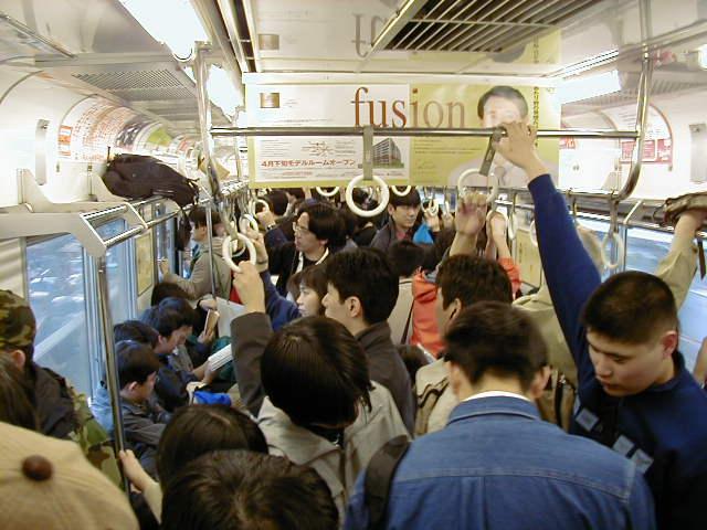 Typical inside of a Japanese subway train. Obviously during a busy time. Compared to the true rush hour, however, this isn't so bad. Being able to get a free seat is the best feeling when you're tired or coming home from a long day and such.