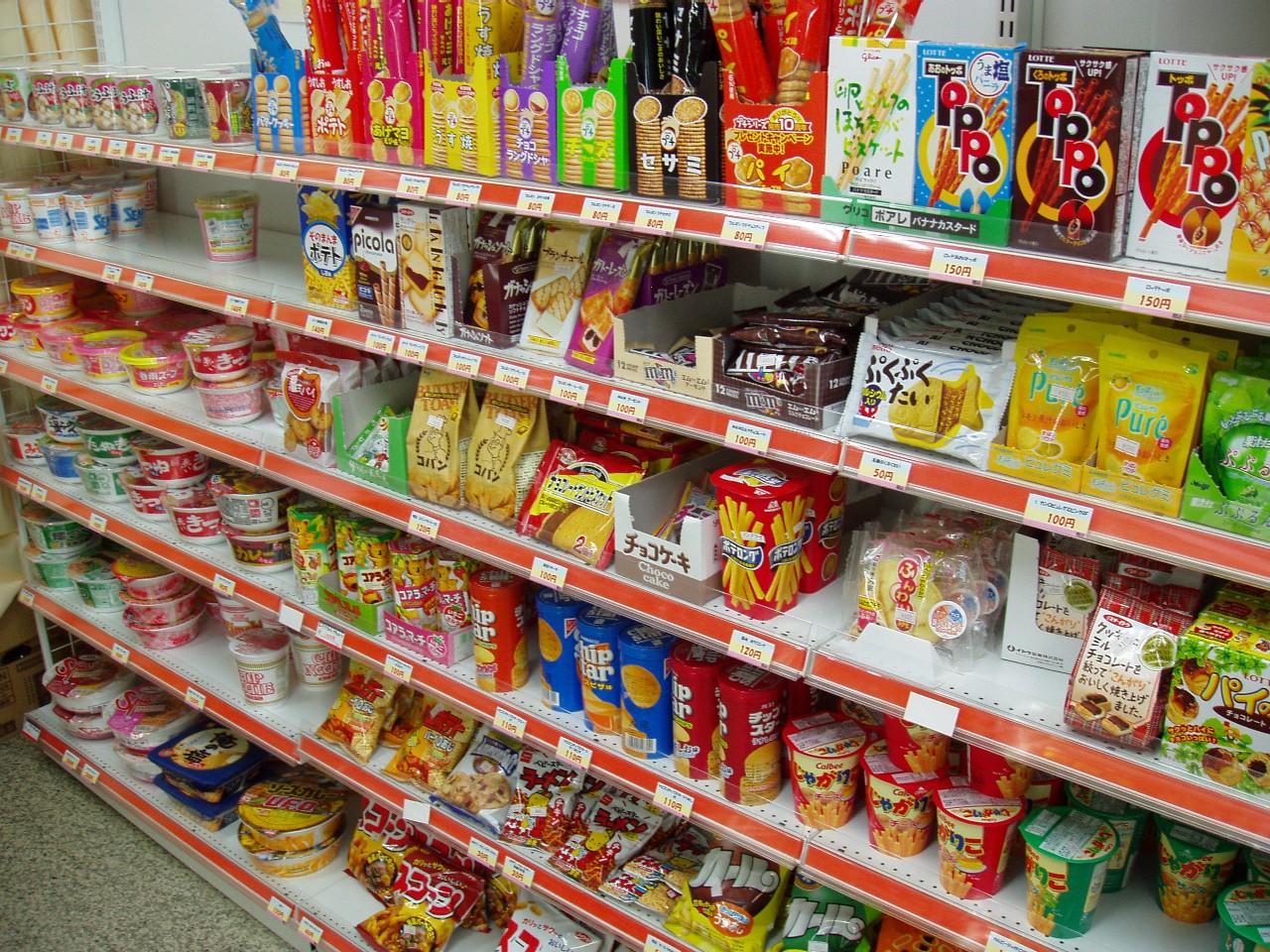 Typical snack shelf at a Japanese convenience store. I couldn't even tell you what all of these are, but I can tell you that they're likely all delicious. It's like munchie paradise.