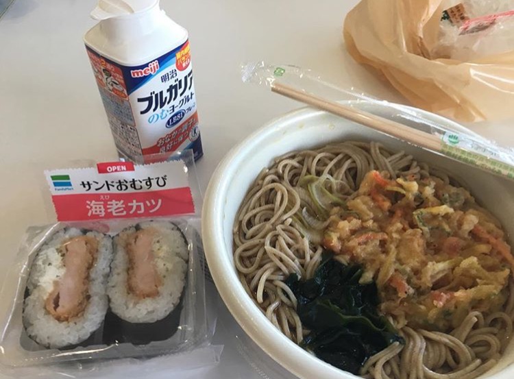 A lunch I bought a few months ago from a convenience store on my university's campus. From left to right: ebi katsu omusubi (shrimp fry rice-ball sandwich), Burugaria (Bulgarian yogurt drink), and tanuki soba (soba noodles with broth and deep-fried tempura bits). It all cost me about 5 dollars... disposable wooden chopsticks free of charge.
