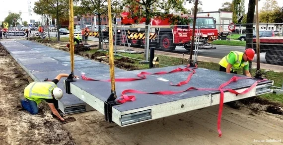 Construction of the world's first solar road in Krommenie, outside Amsterdam