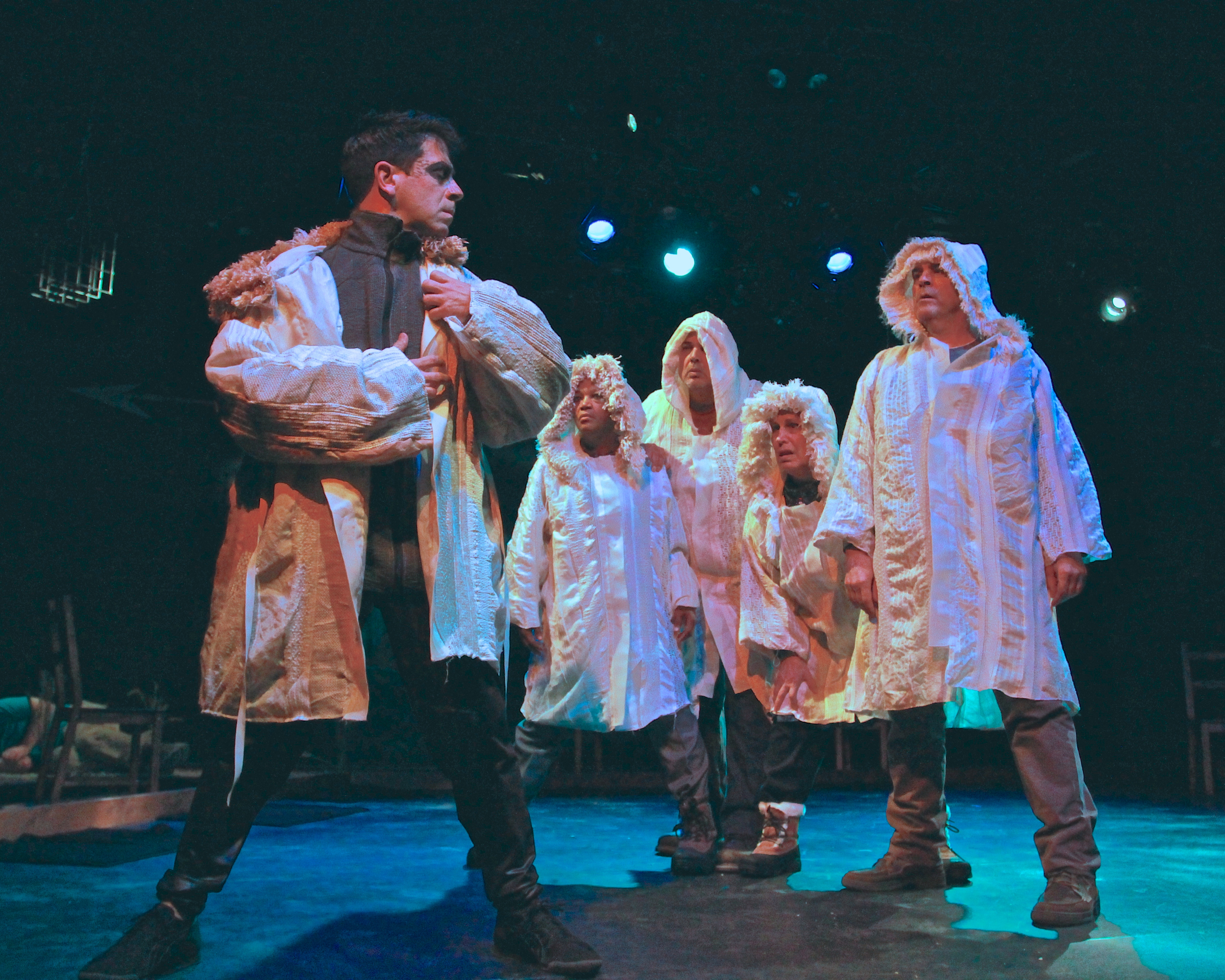 from left to right Raven (Gendell Hernandez*) Villagers (Cathleen Riddley*, Michael Torres*, Lynne Soffer*, Lawrence Radecker) photo credit: Vicki Victoria *Member Actors' Equity Association