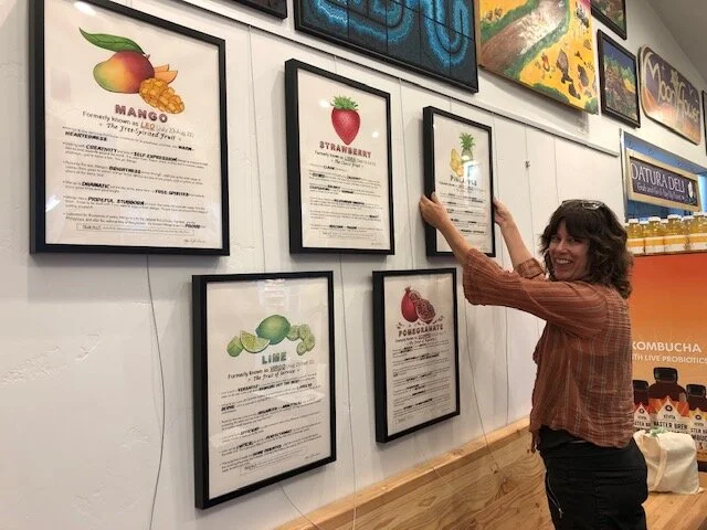 Shari Zollinger helping to hang the show!