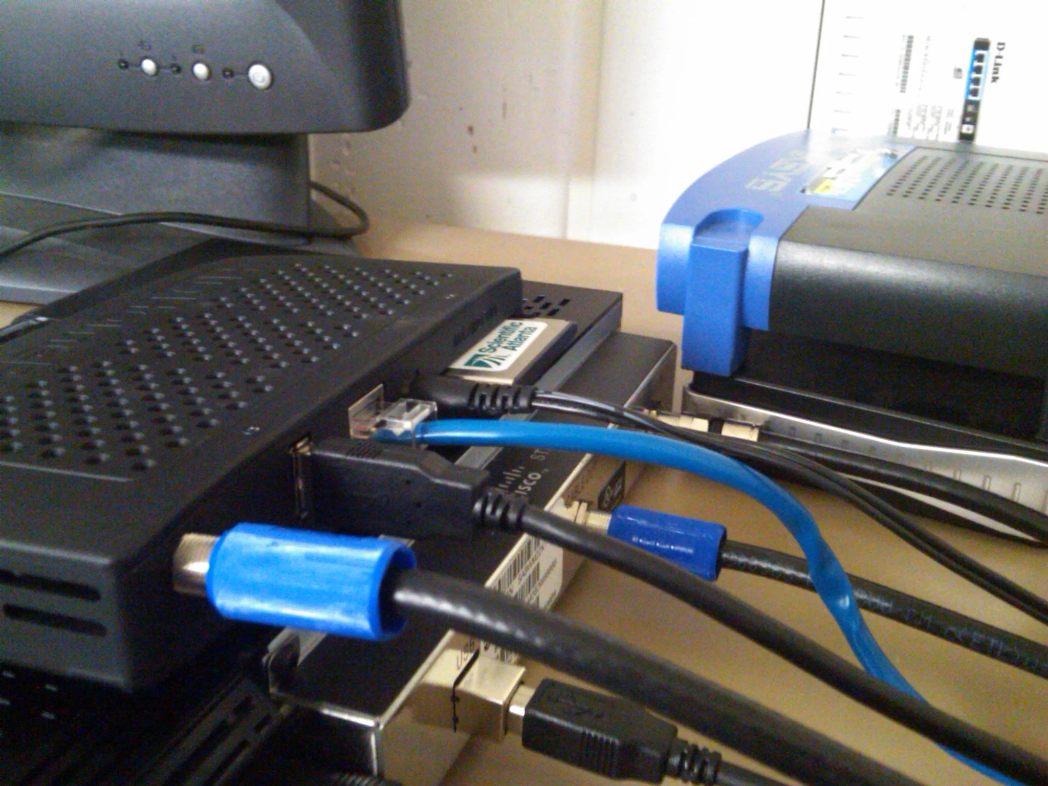 CableCARD plugged in to an HDHomeRun Prime (sitting on top of a tuning adapter)