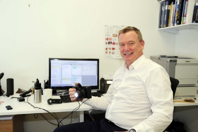 Dr Chris Boberg with dermatoscope