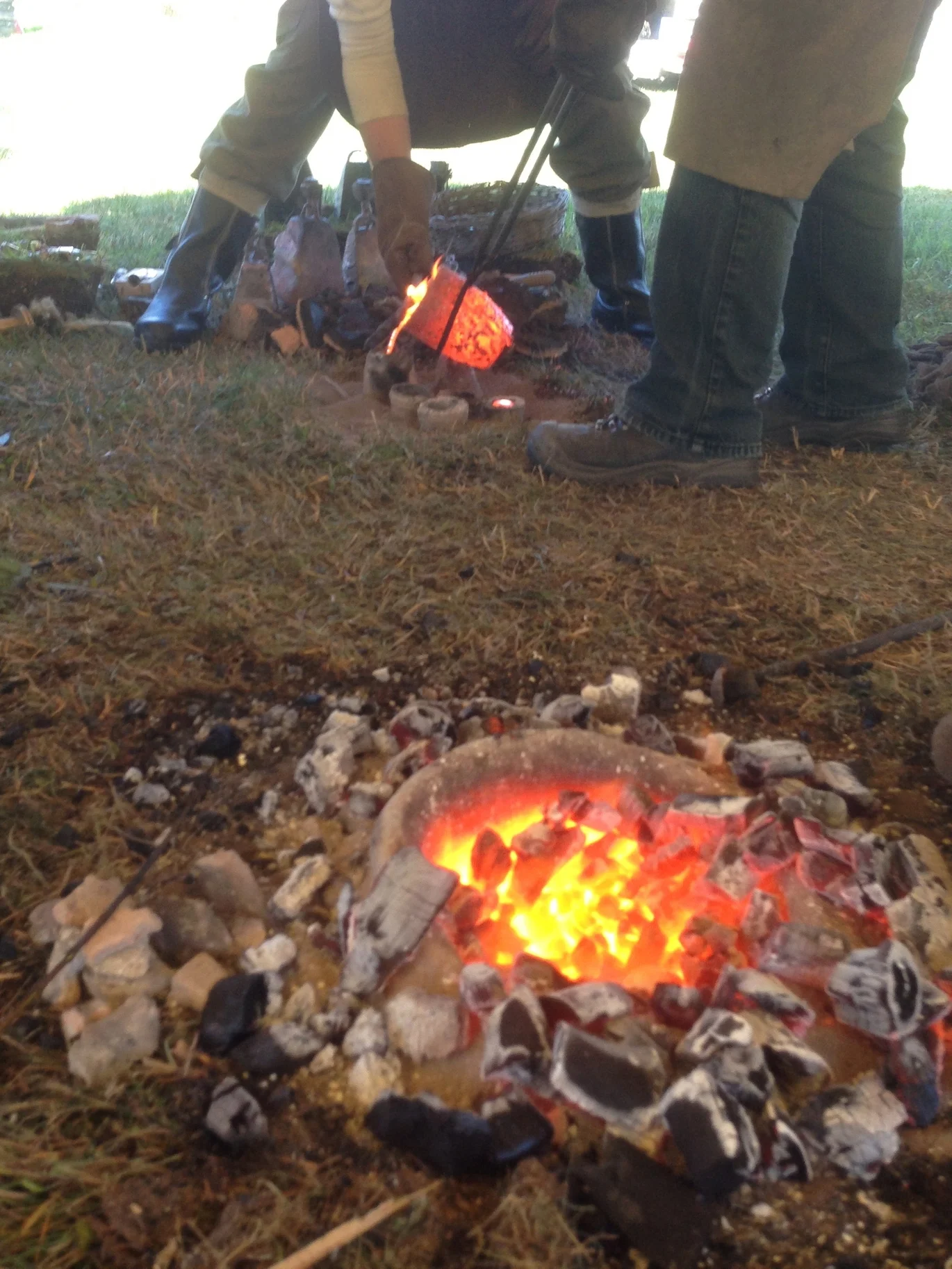 Pouring a mould from a pit furnace at Allihies