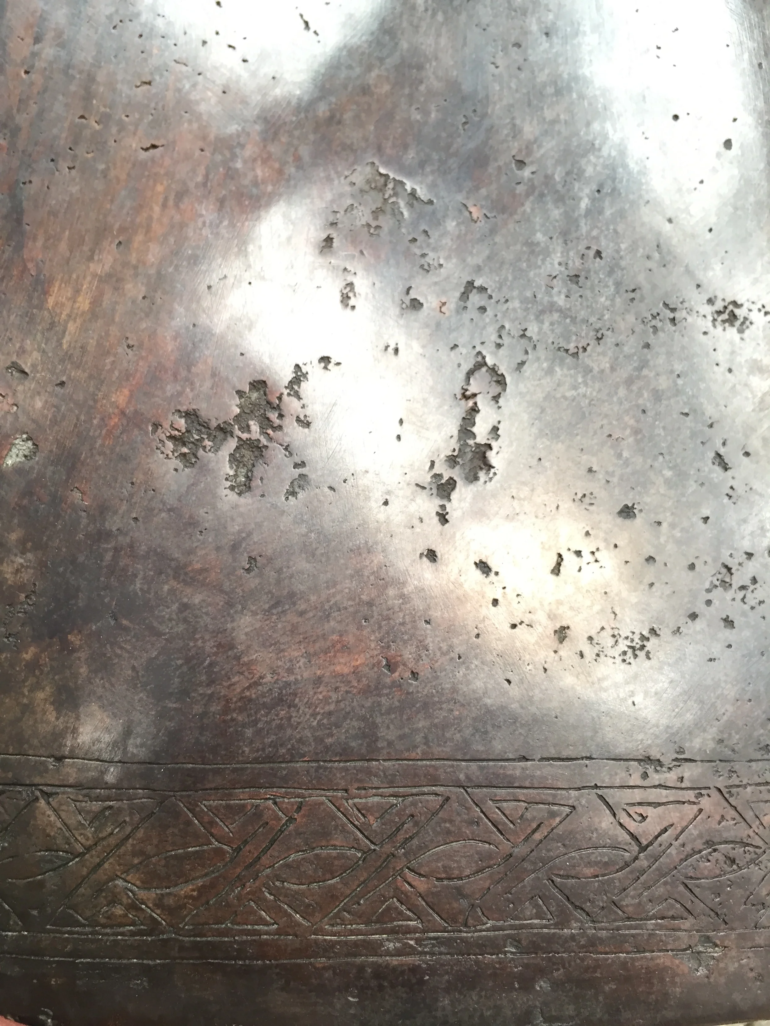 Detail of the intricate decoration on the base of the bell