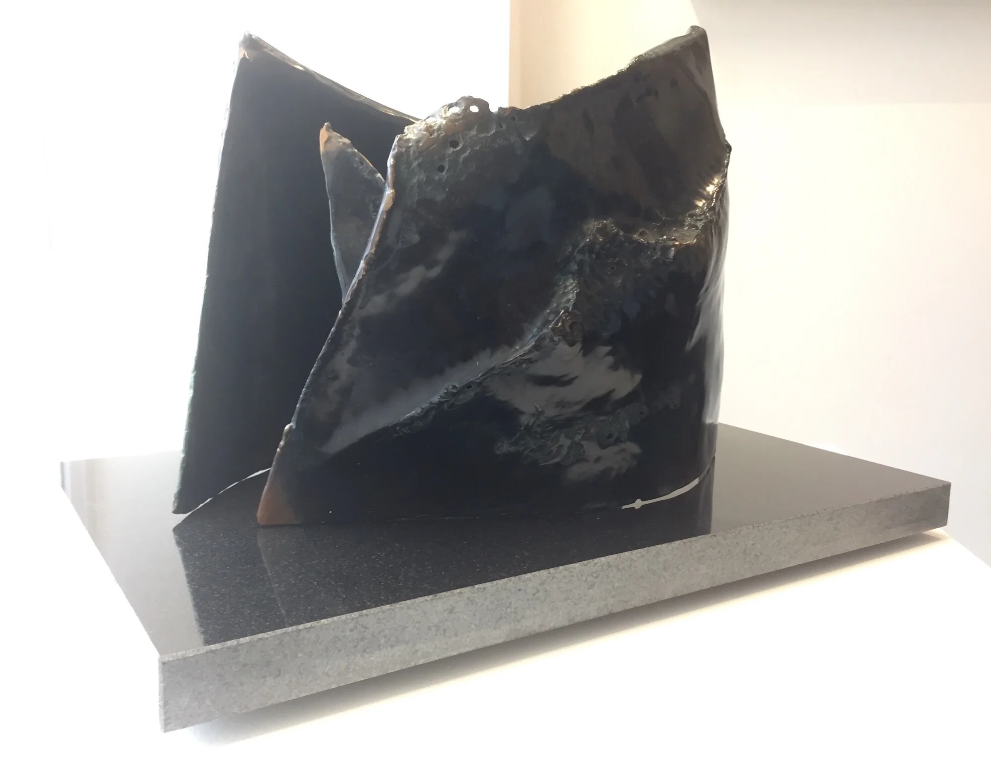 To the People of the Sea; repoussé bronze and granite, 2016