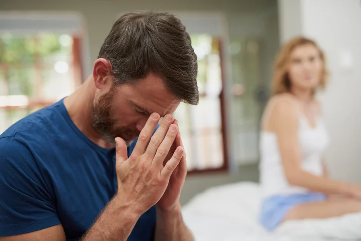 Shot of a mature couple having marital problems in the bedroom at home