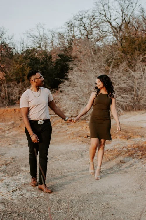 Blkcoupleholdinghands.jpeg