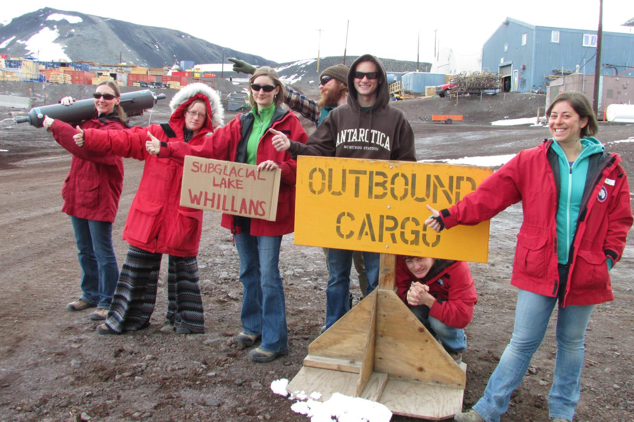 Students attempt to hitch a ride to Subglacial Lake Whillans, as the wait at McMurdo drags on. Hitchhiking in Antarctica is not very effective. PHOTO BY SUSAN KELLY