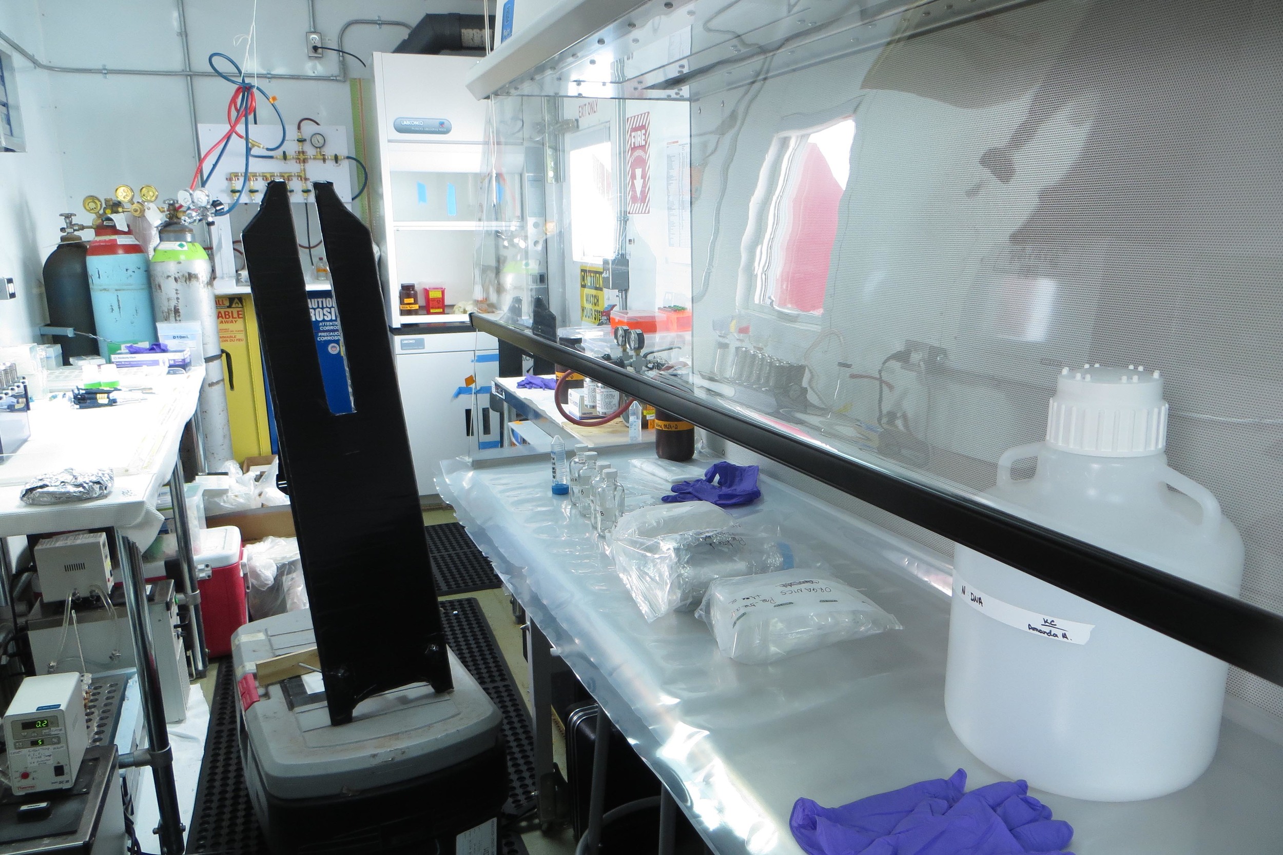  The microbiology/chemistry lab at Subglacial Lake Whillans, set up to receive a water sample, with a black cradle to&nbsp;hold the sample bottle. PHOTO BY TRISTA VICK-MAJORS 