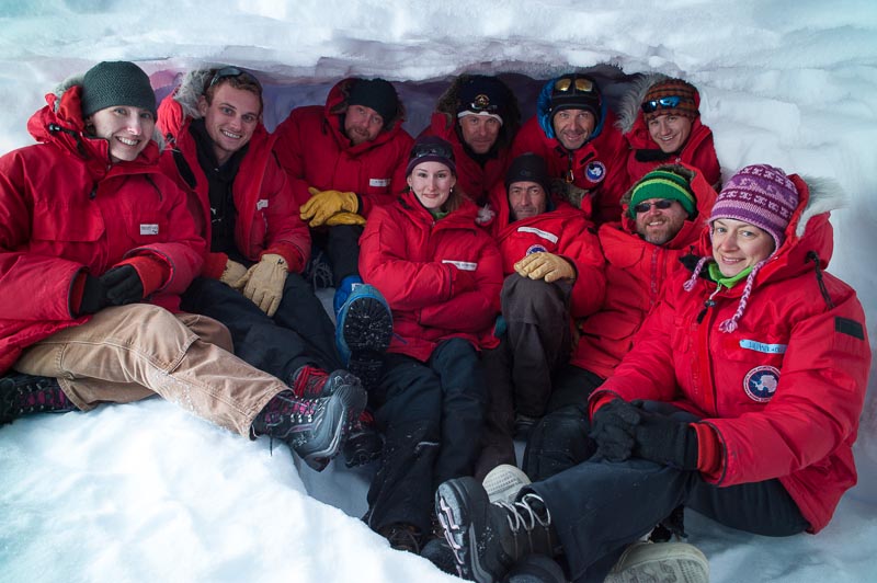  The microbiology team in the "ice cave freezer," a pit dug into the snow and ice in which samples were kept. PHOTO BY J.T. THOMAS 