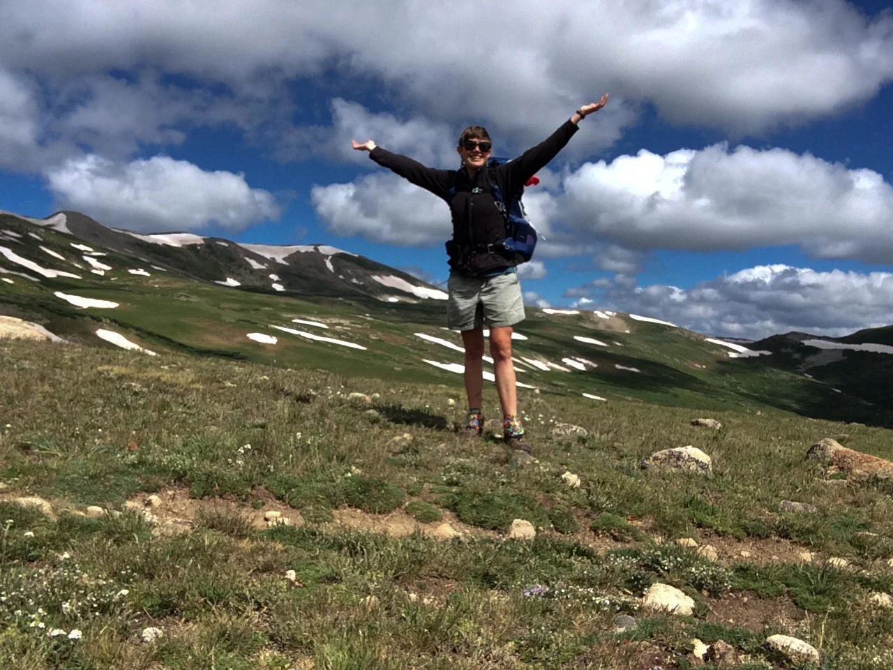 A joyful moment above treeline. PHOTO BY WILLOW BELDEN