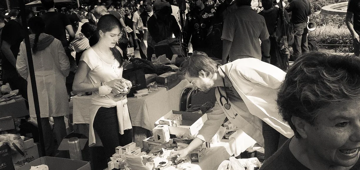 Hundreds or even thousands of volunteers brought donations of medicines, bottled water, baby food, pet food and more to a donation center in Mexico City following the September earthquake there. (photo by Maya Kroth)