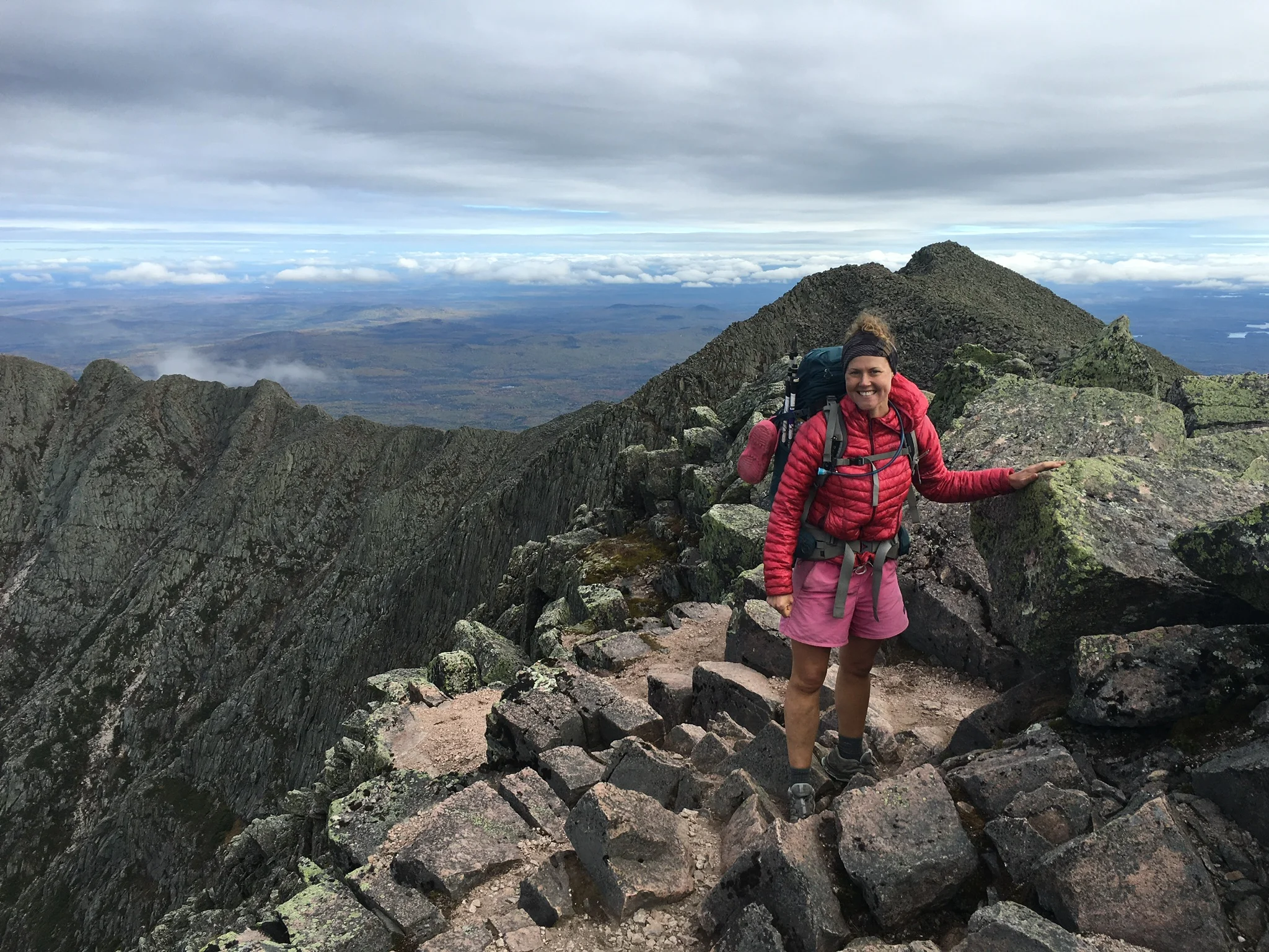 Laura Johnston, head of Out There’s ambassador program, finishes a thru-hike of the Appalachian Trail at Mt. Katahdin. (Photo courtesy Laura Johnston)
