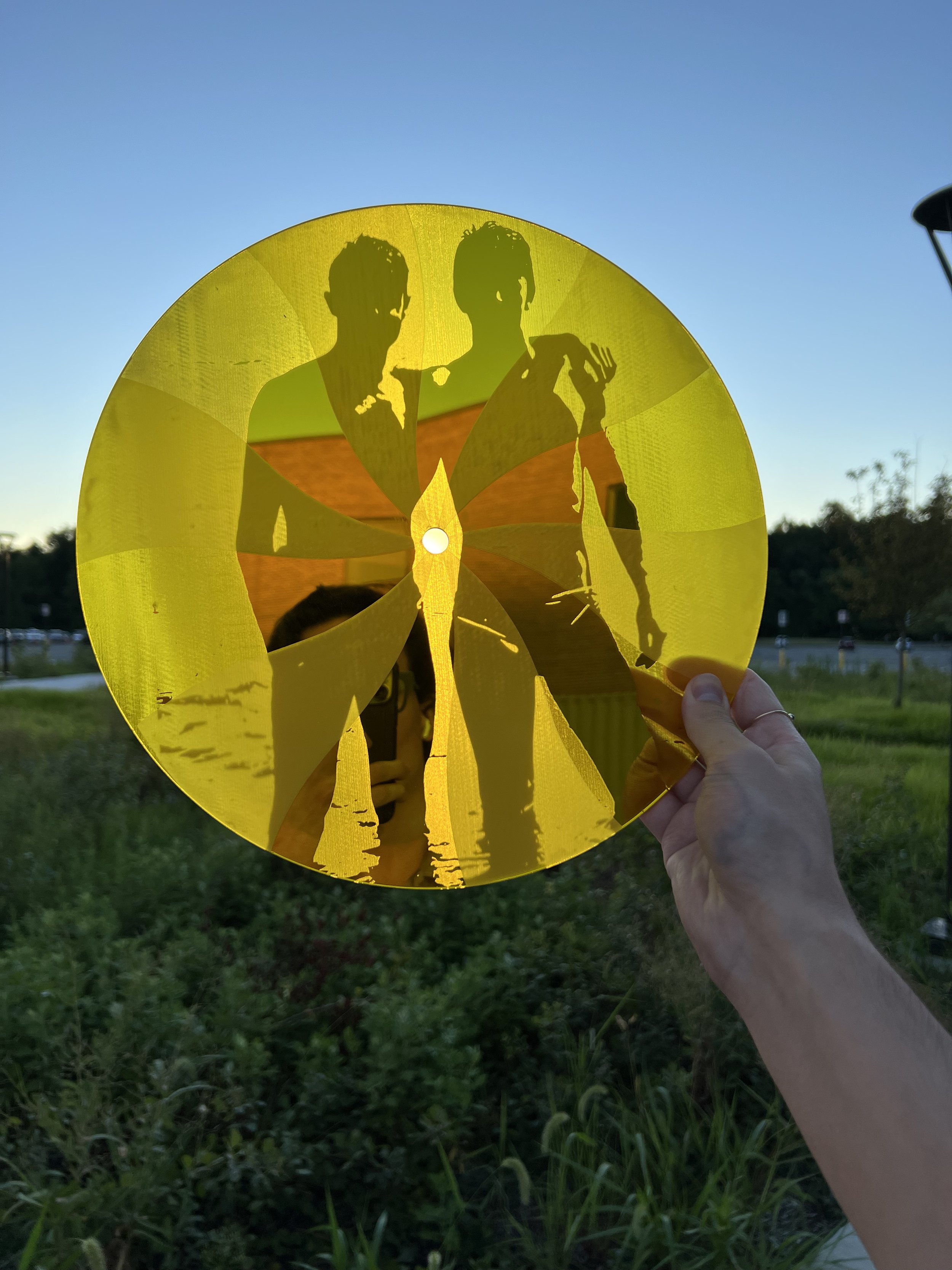 “Somebody’s Sun”, August 2022 Laser-etched mirrored acrylic