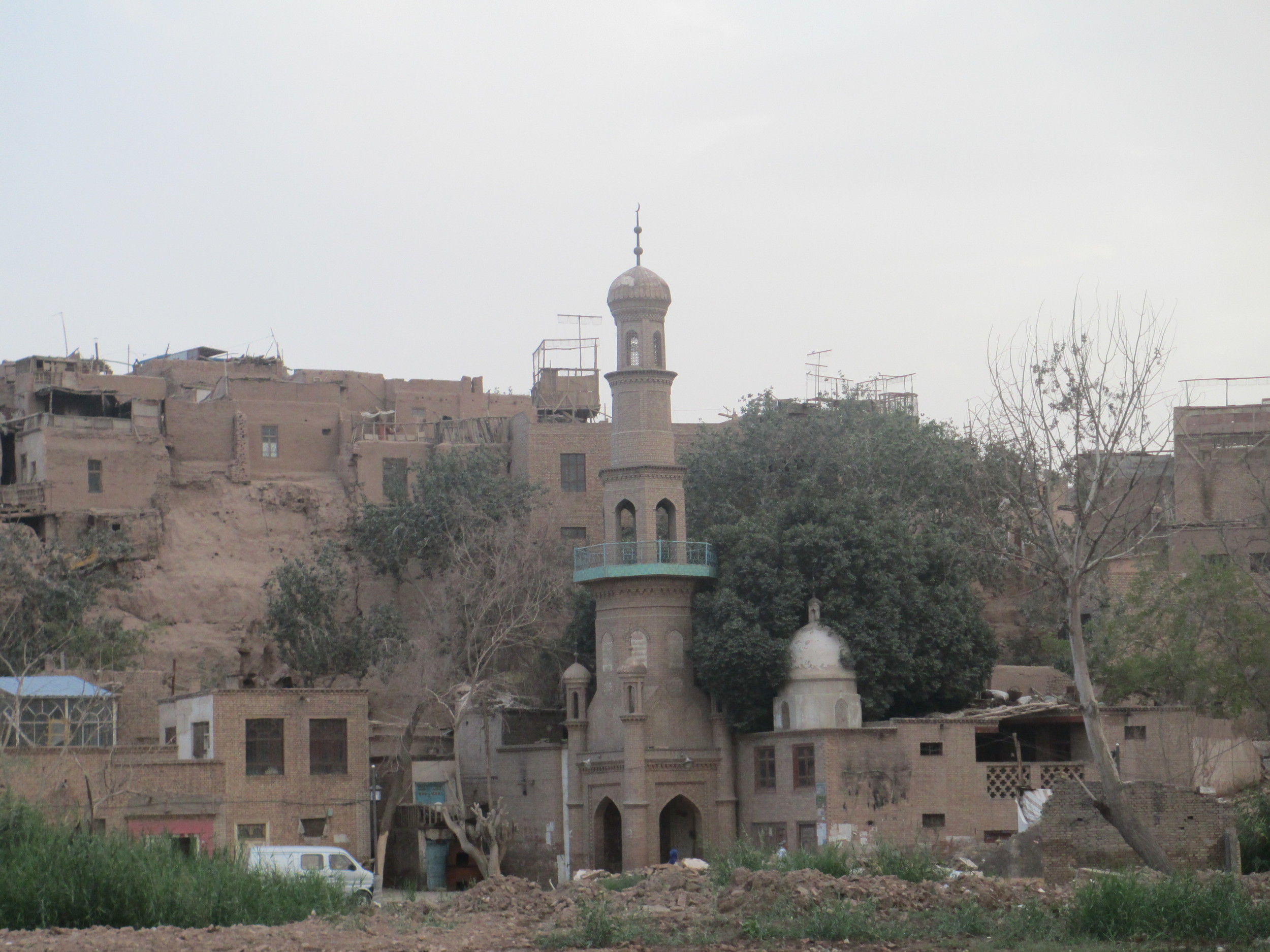 Kashgar , emporium of central Asia thru the centuries, still the largest market town there. Soon these buildings will be ripped down and old Kashgar will exist no longer