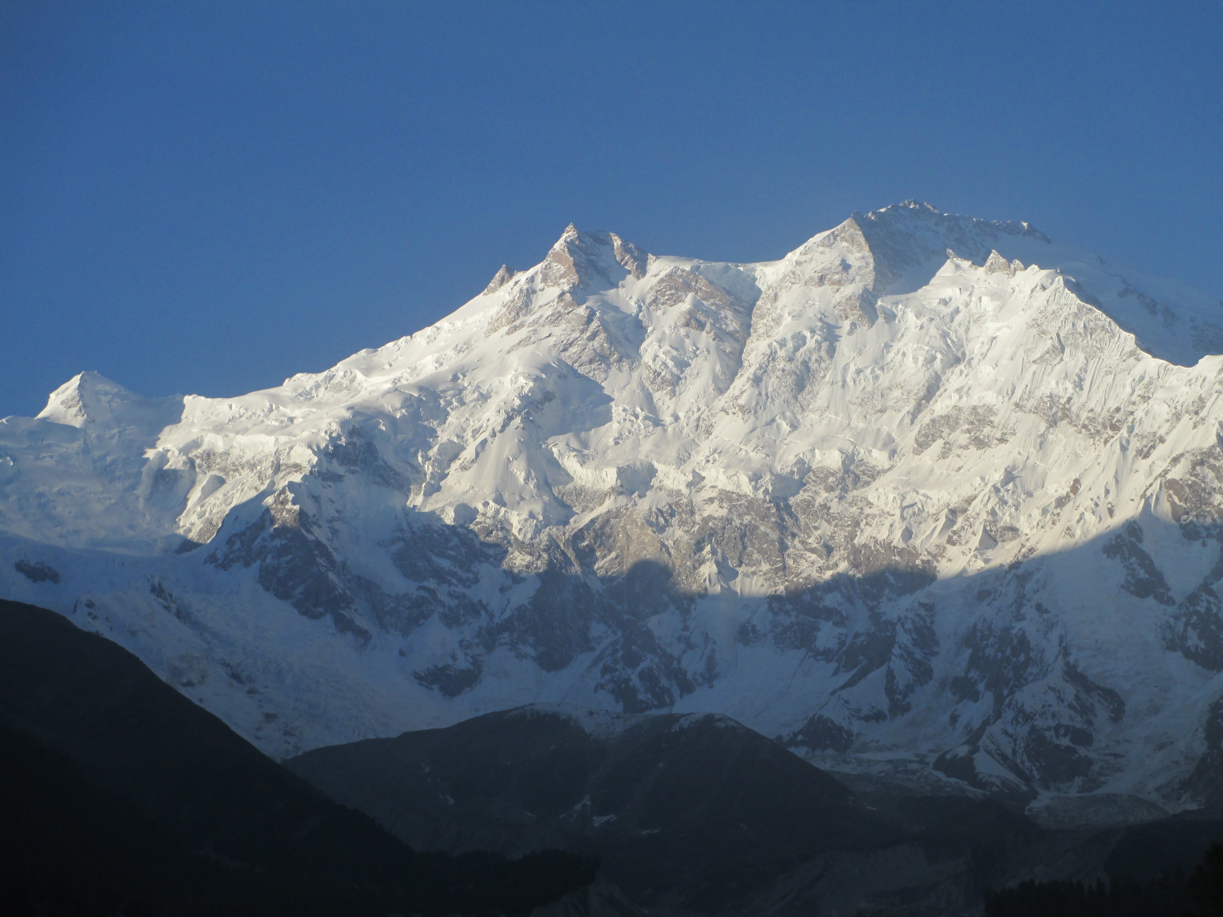  "The name means Naked mountain , but although its a famous name I don't think its a good one,for the peak is anything but naked- not at all a thing of bare rock,but,on the contrary so covered with snow and ice, cornices and glaciers that it is almos