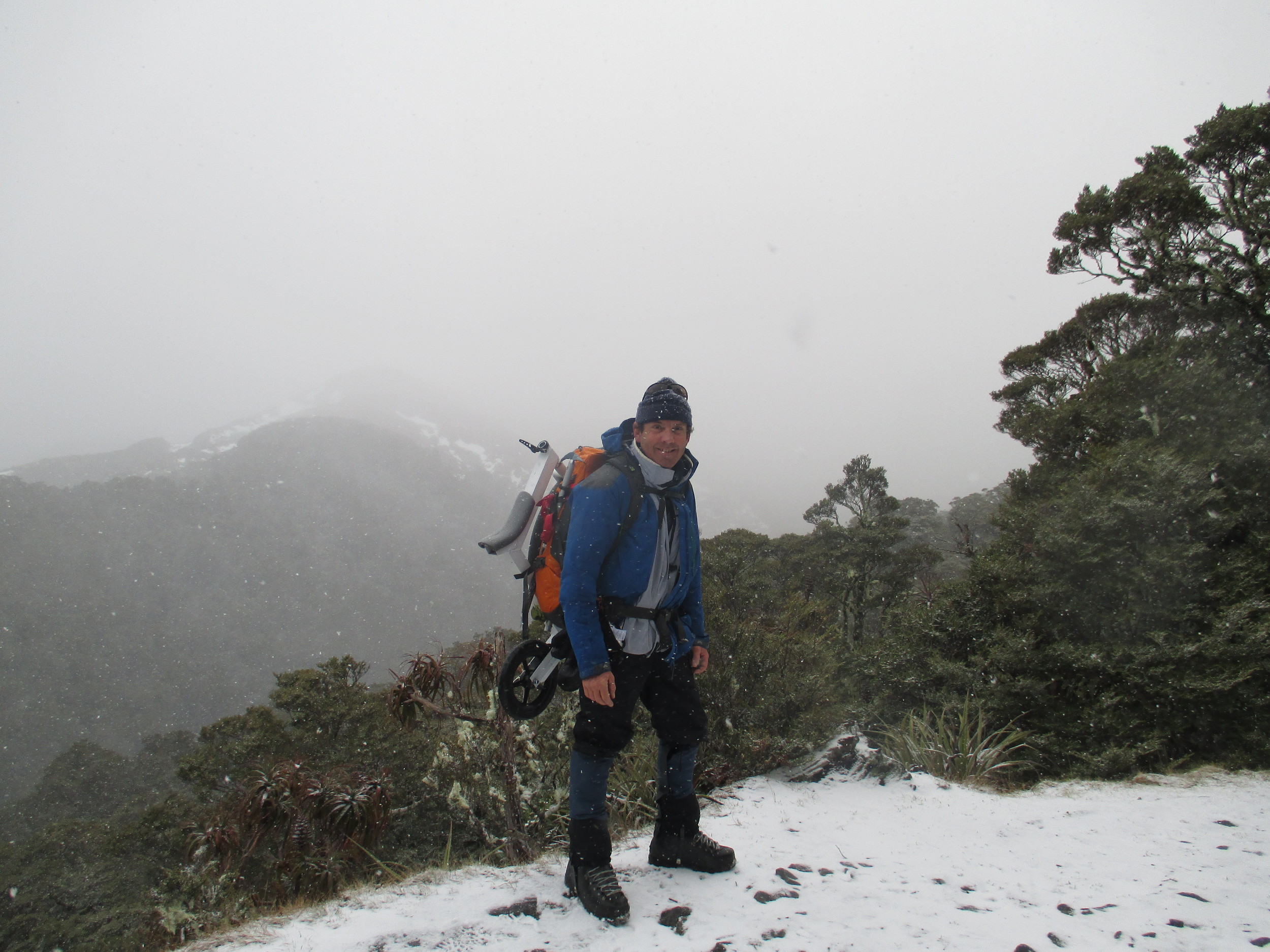   Heading up Mt Arthur in a storm 2015  