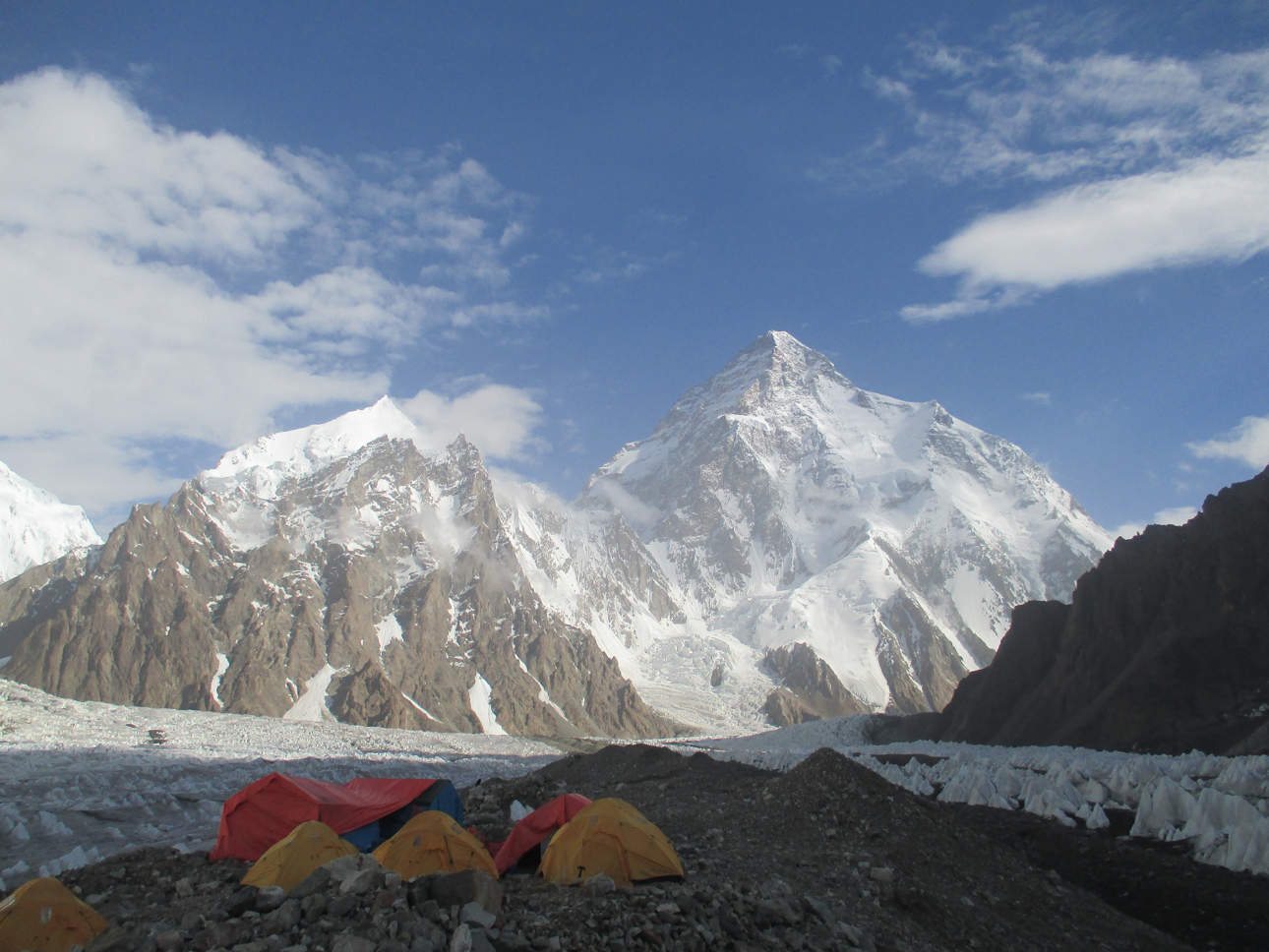  To the left of &nbsp;K2, was a bewildering mass of &nbsp;peaks and  glaciers &nbsp;whose existence &nbsp;I had &nbsp;not suspected. &nbsp;Sitting  alone gazing at the &nbsp;cirque forming the head of &nbsp;the  K2, glacier was an experience I shall 