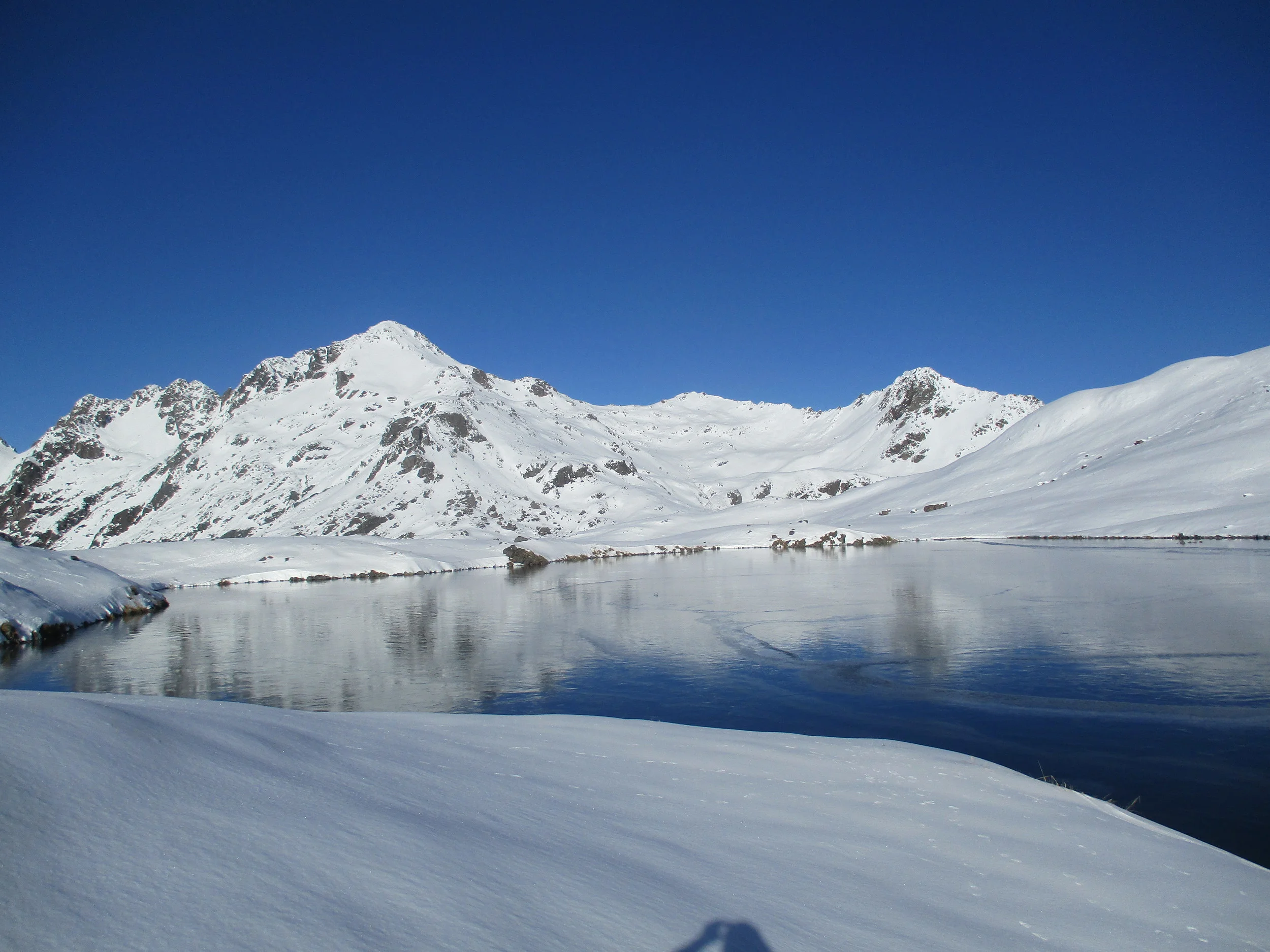 Lake Angelus - still not iced over with Mount Angelus behind.
