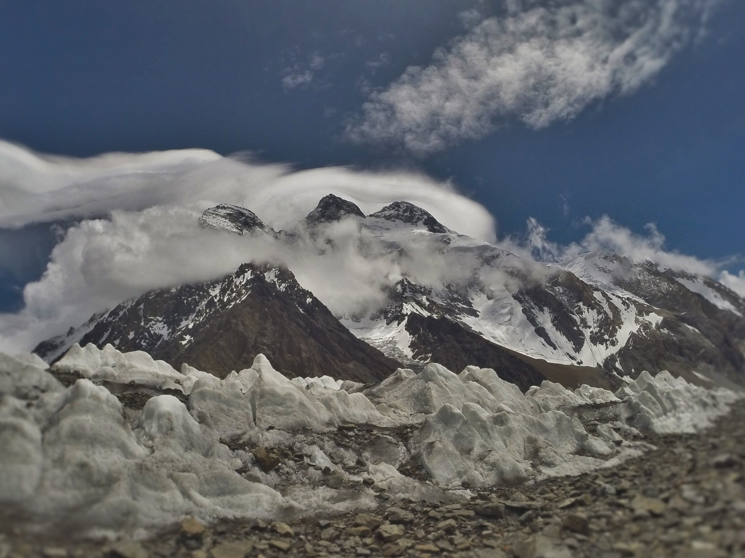 Broad Peak - actually 3 peaks Broad Peak North 7490 m, broad peak Central 8011 m and Broad Peak main 8051 m. This photo taken from northern end of Goodwin Austin Glacier at its confluence of the Savoia Glacier.