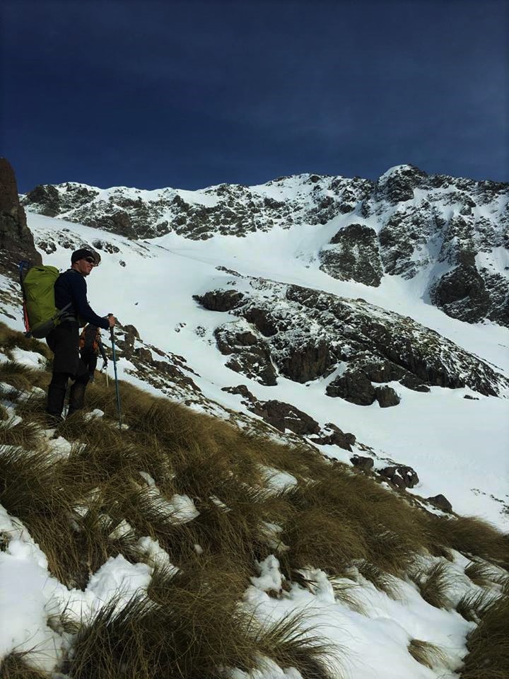 Jake takes a break on the way up Mount Chittenden , Nelson lakes national park.