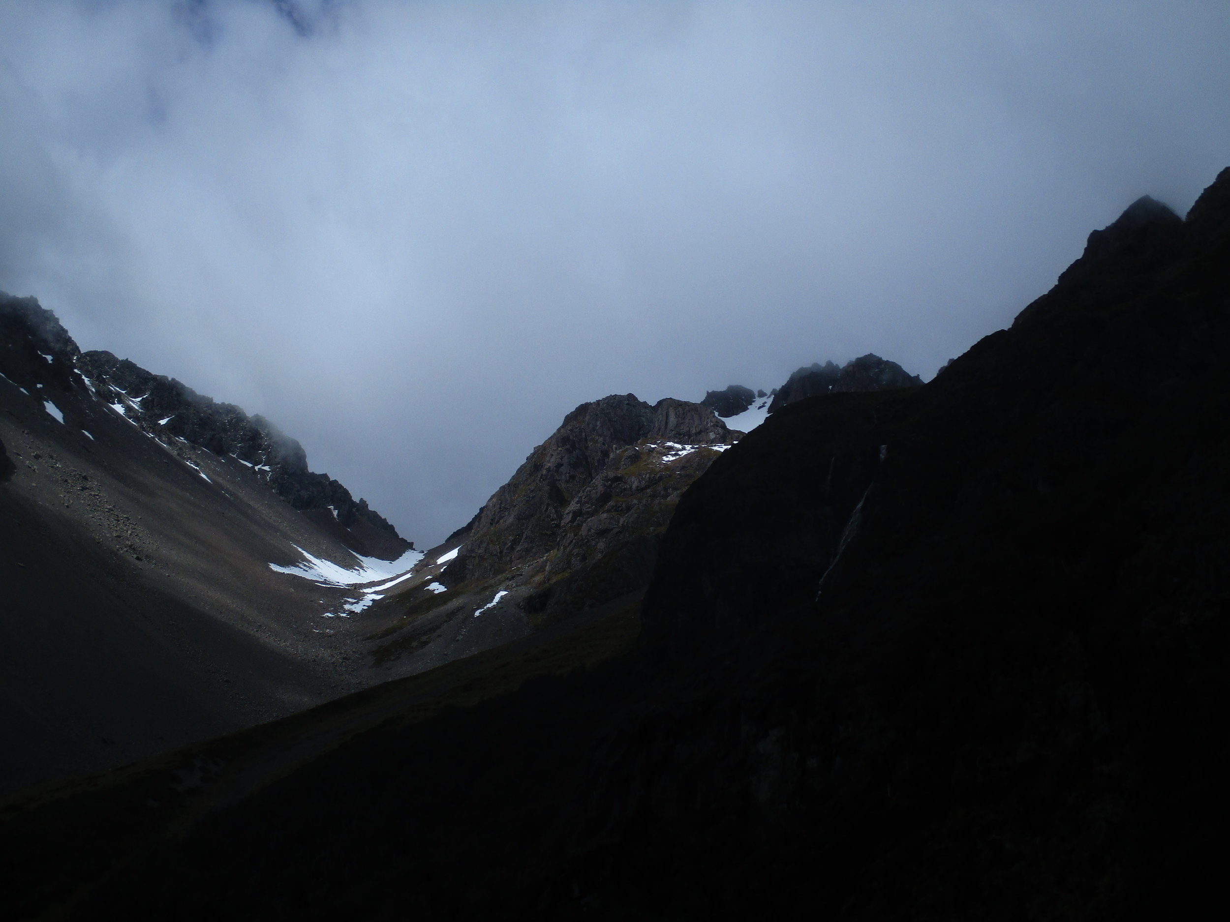 Heading up the pass between Angelus ridge on the right and Mt Angelus on the left. Angelus ridge was days objective. It is rarely climbed and being off the beaten track, and not a particularly attractive ridge line of peaks, composed as I found out of extremely loose rotten rock.