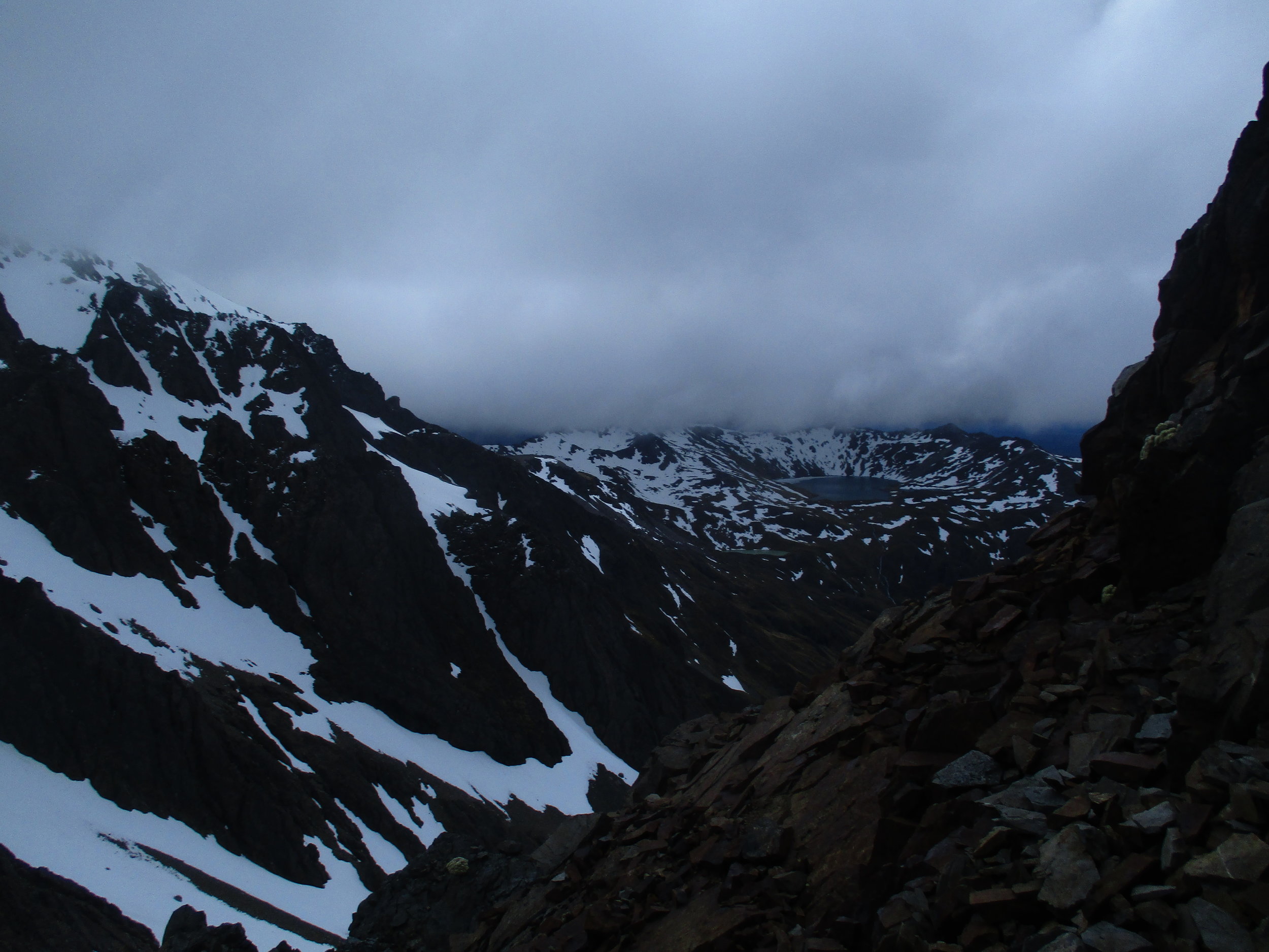 Climbing high above the Col one gets a different angle on Lake Angelus which looks almost volcanic 