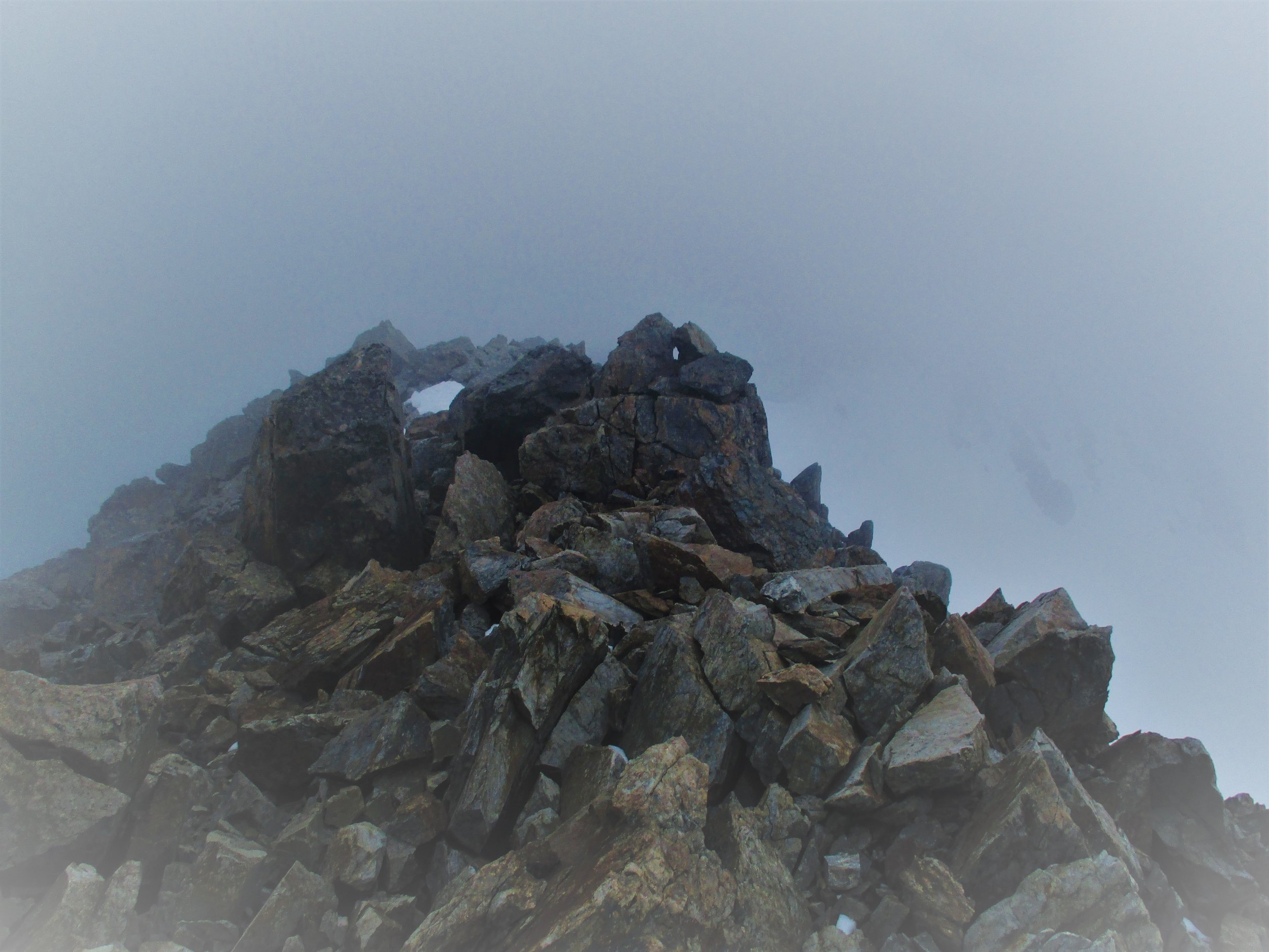 The ridge line was wide but very broken and almost no rock was attached to any other making for very slow going.