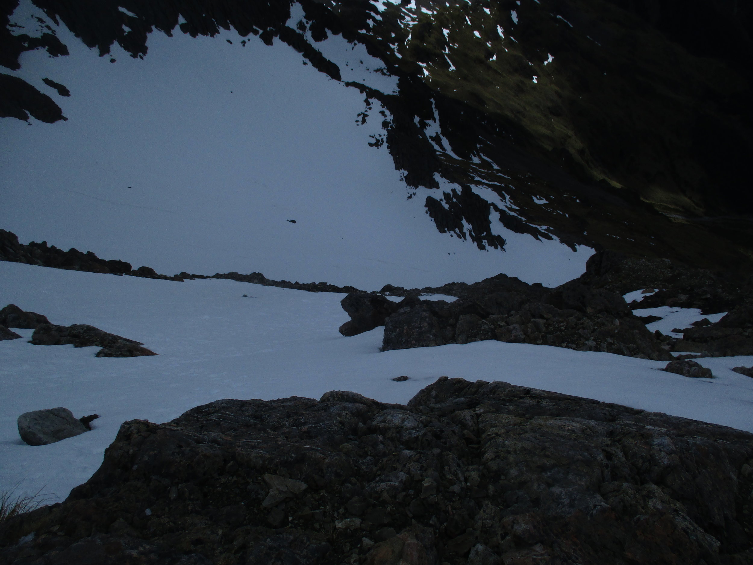  Steep tussock gives way to steeper rock which is fortunately quite firm than a snow basin which is still rising as ste eply as anything on Cotterell the day before finally zig zagging up steep snow fields to the Top.