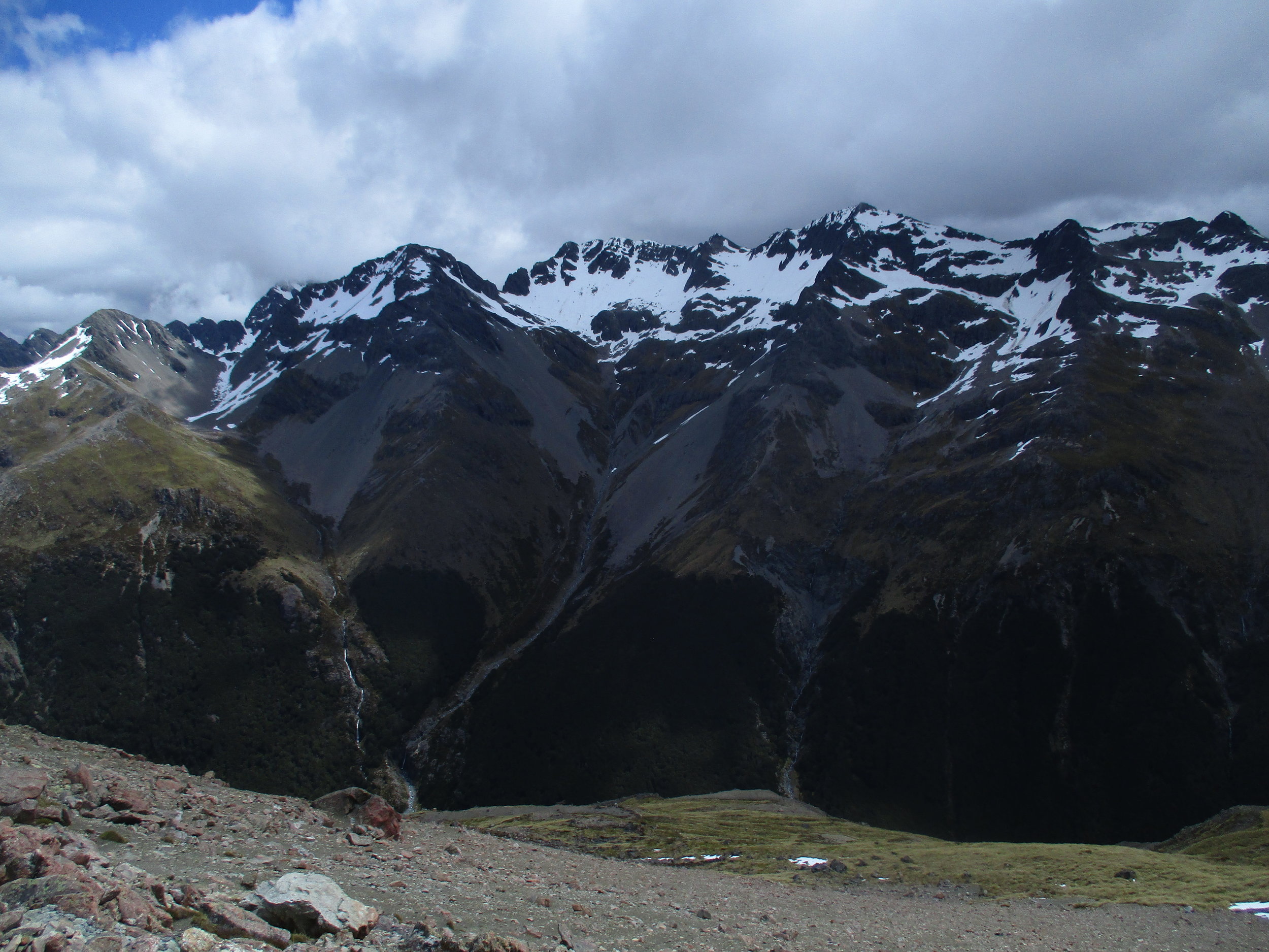 Some rather fine un-named peaks rise high above the Begley valley to the West.