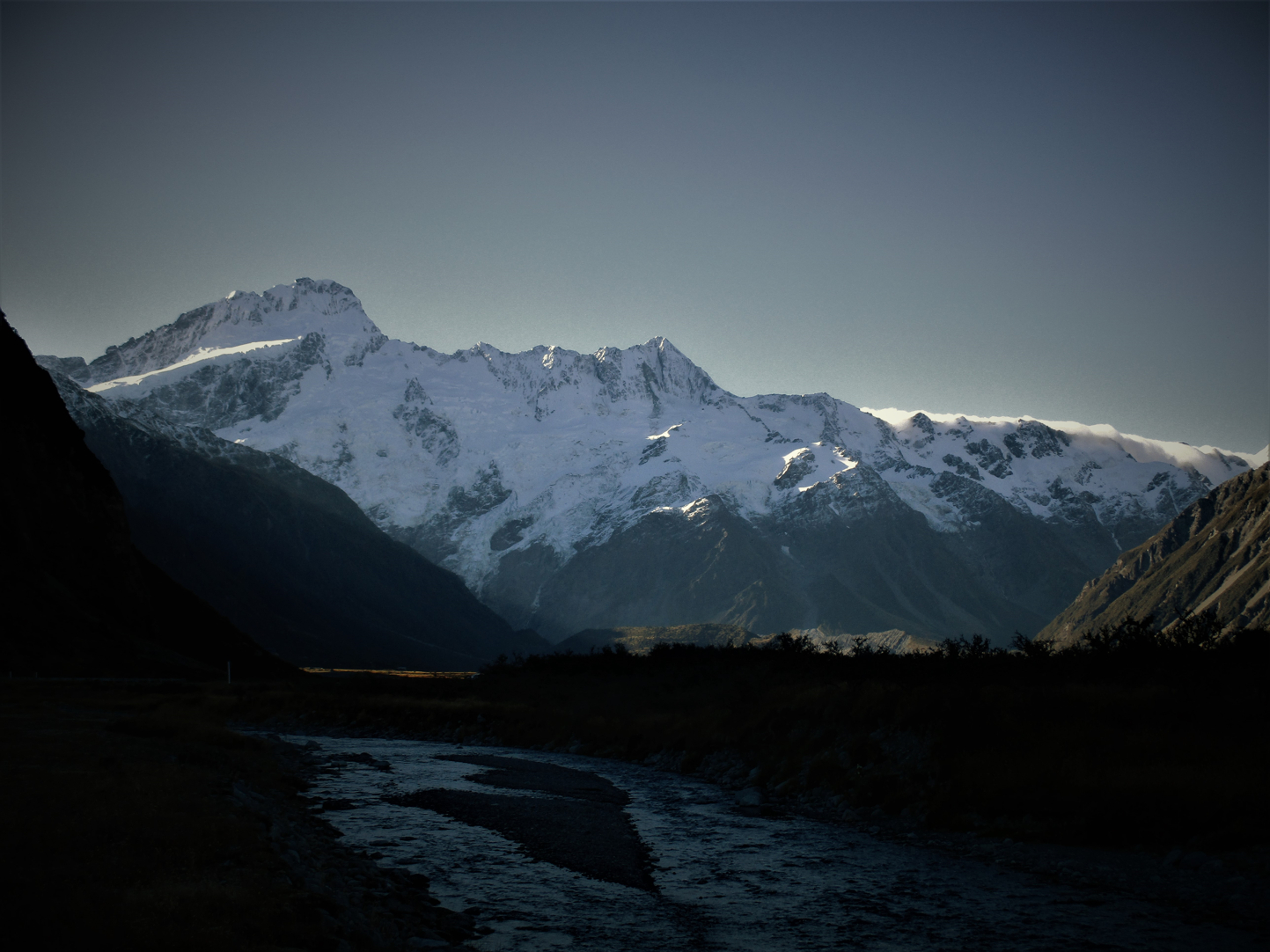 Mount Sefton , New Zealands 4th highest peak rises above Mt Cook village.