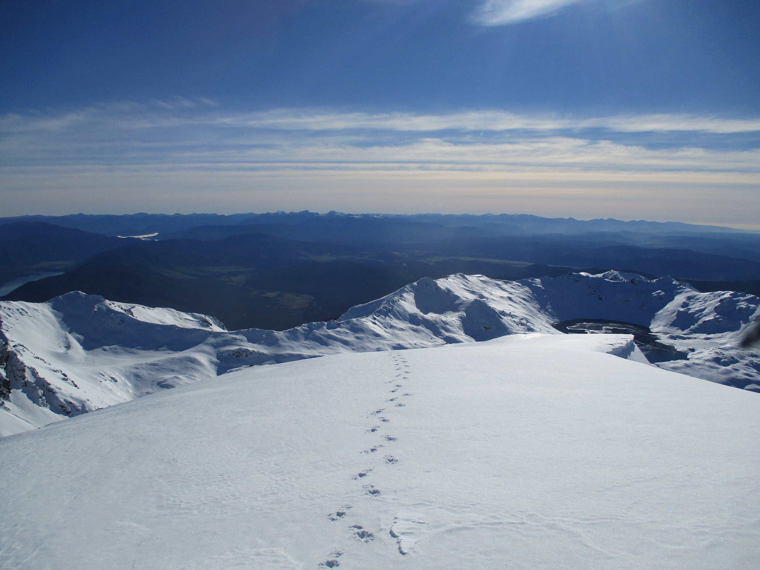   Final steps on Angelus, looking down to the lake than out to sea and Motueka far away  