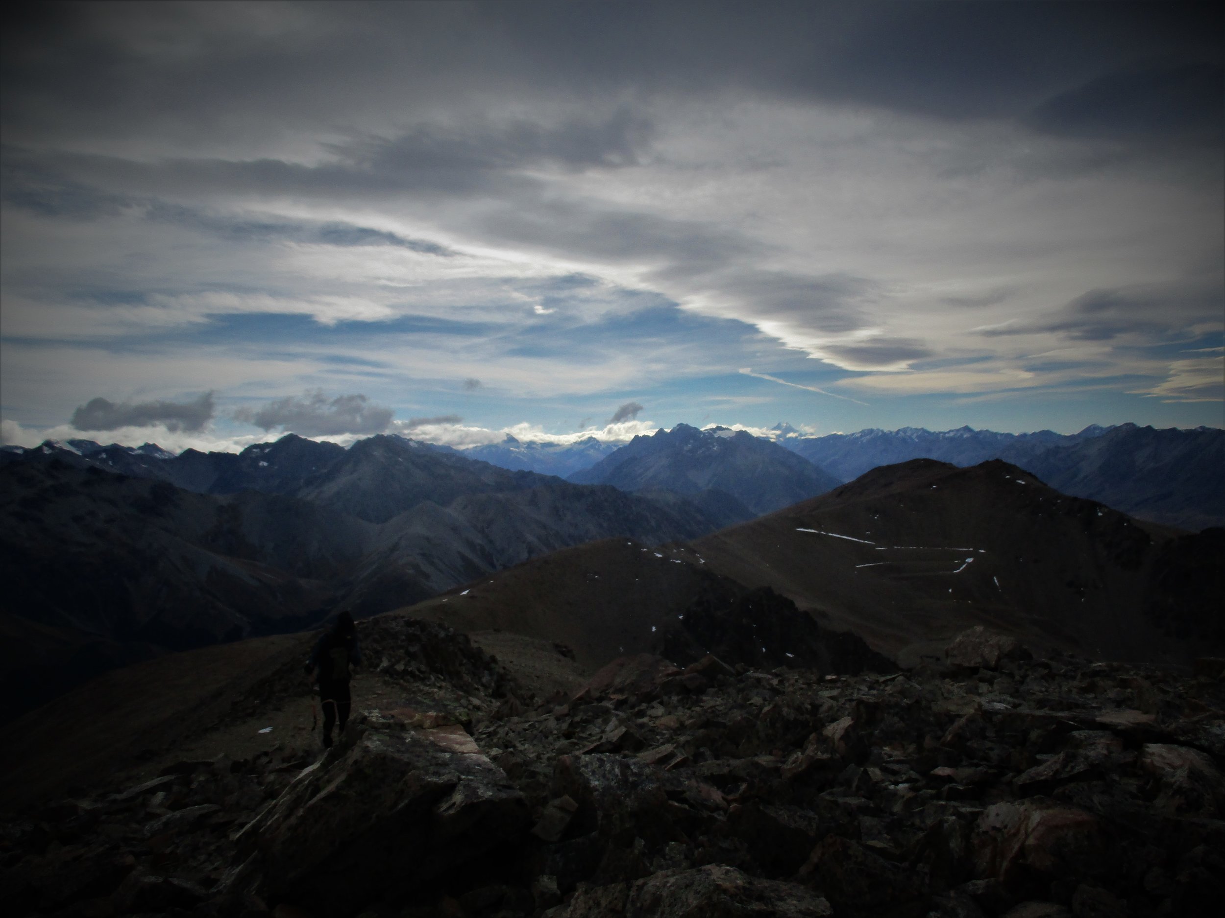 Carl approach's the summit of Mt Sutton 