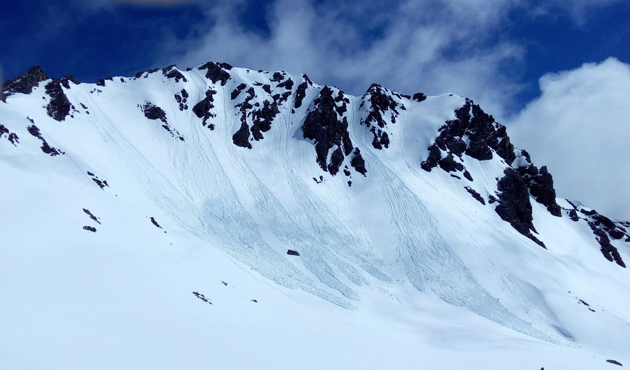 Peak 1926 sports an array of small avalanches , traversing the ridge with Ashley we had either loose rock or snow to contend with