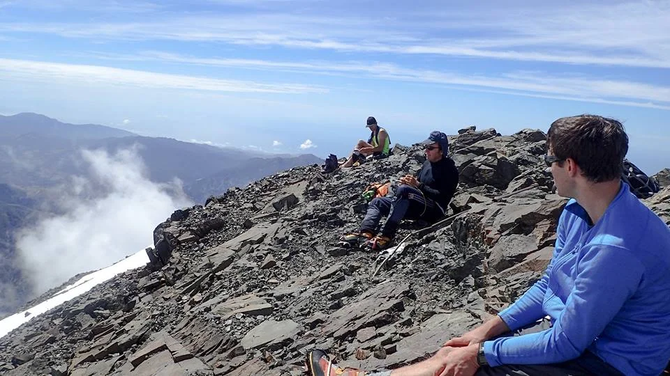 Sunning on the warm summit before the Thunderstorms rolled in.