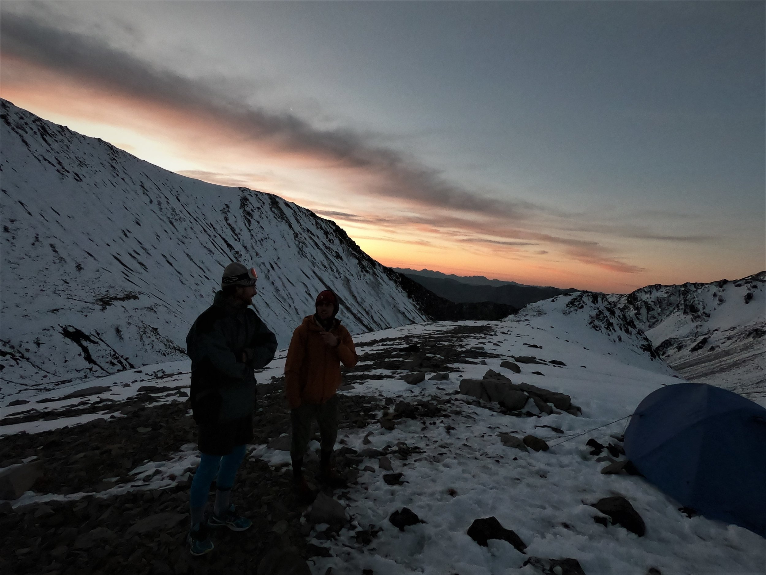 Dusk falls , happy campers Ryan and Carl after a success full day.