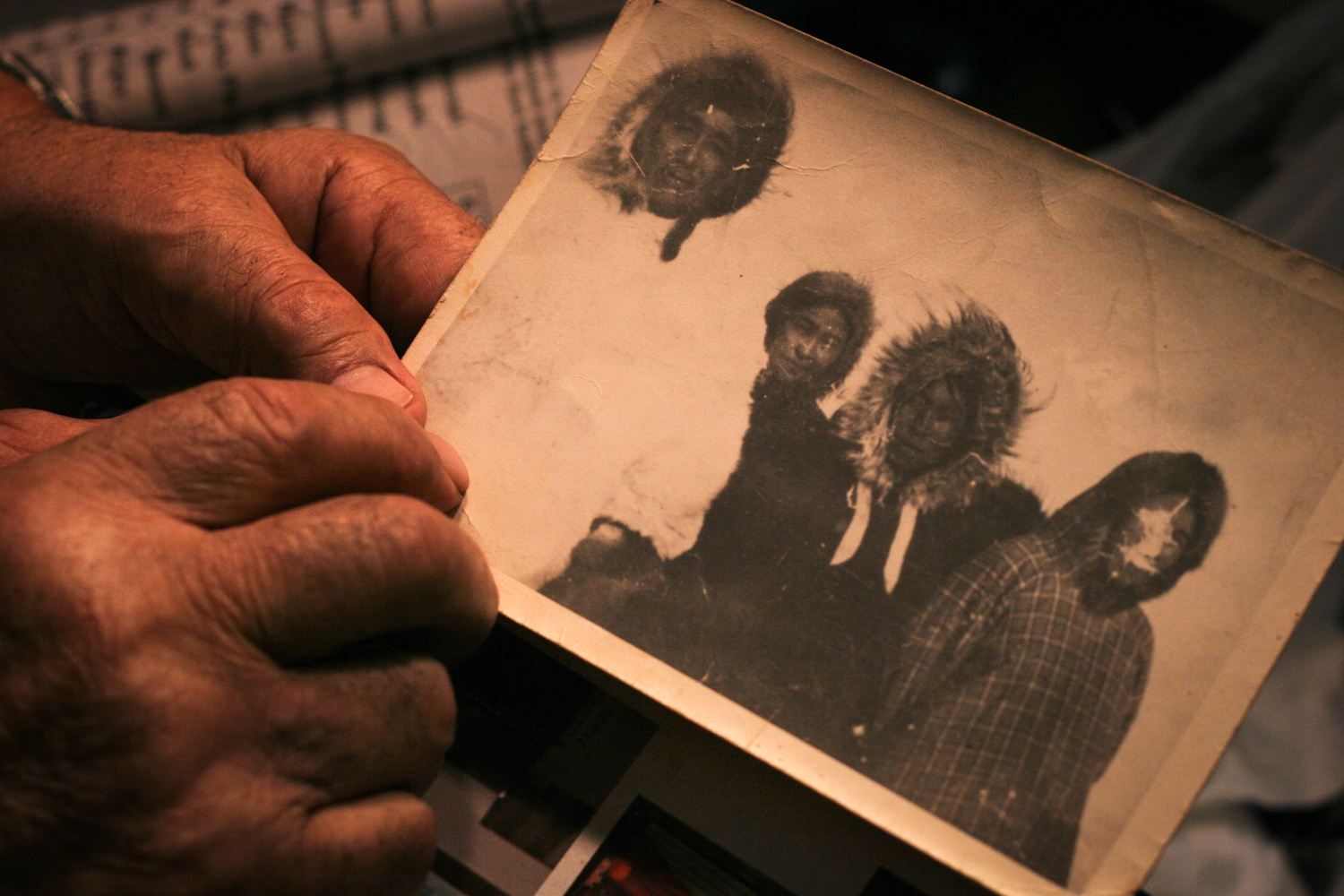  Nelson Greist holds an old photograph of his family who lived their lives in the far north.  